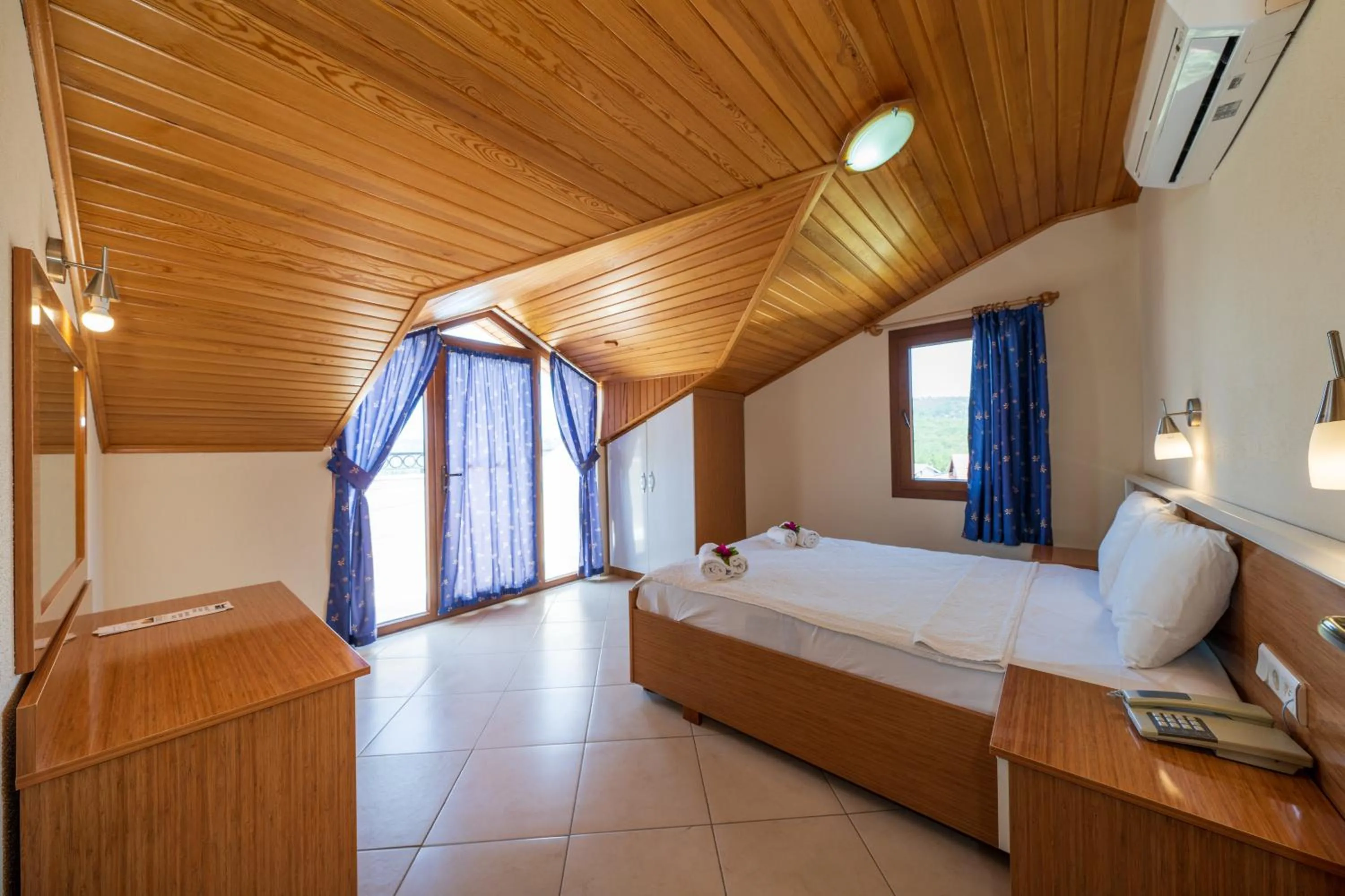 Bed in Gokcen Hotel & Apartments