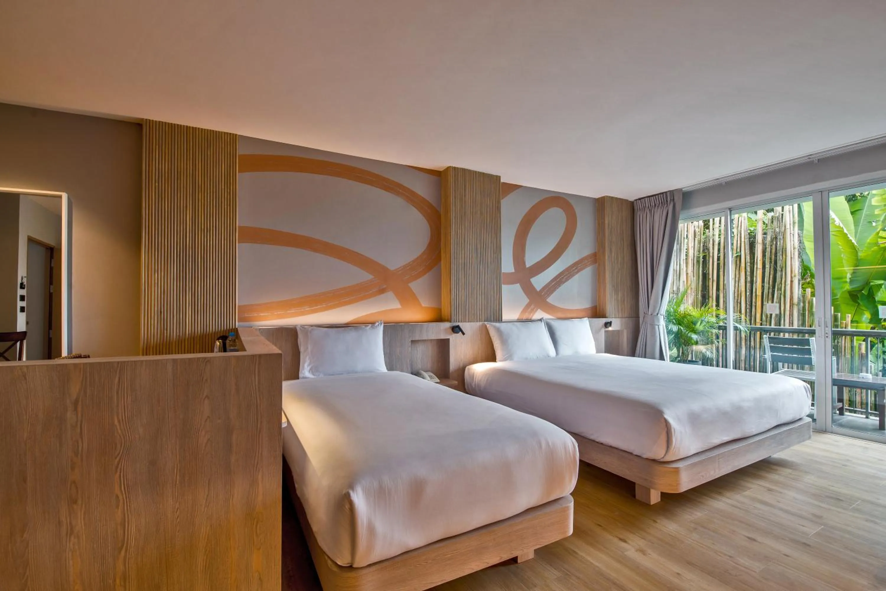 Bed in Baan Karon Resort