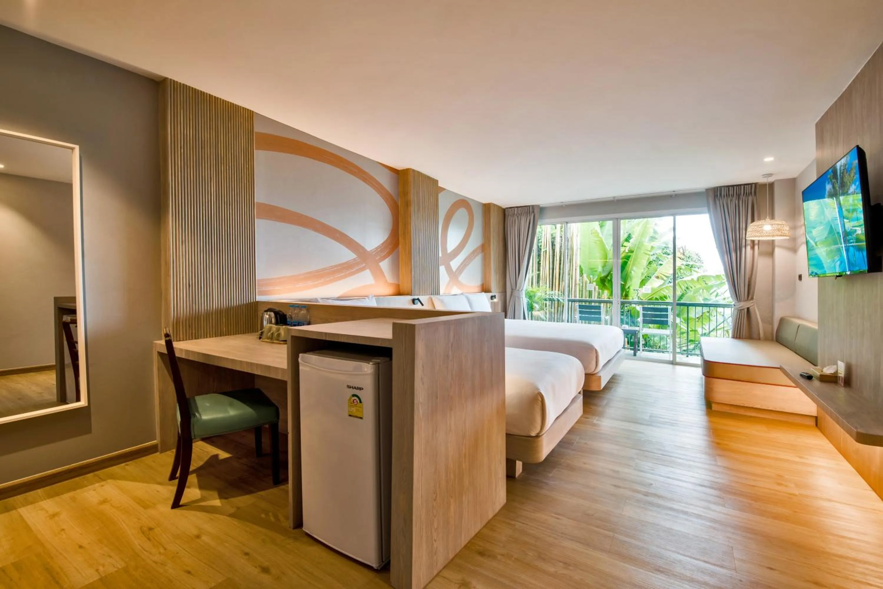 Bed in Baan Karon Resort