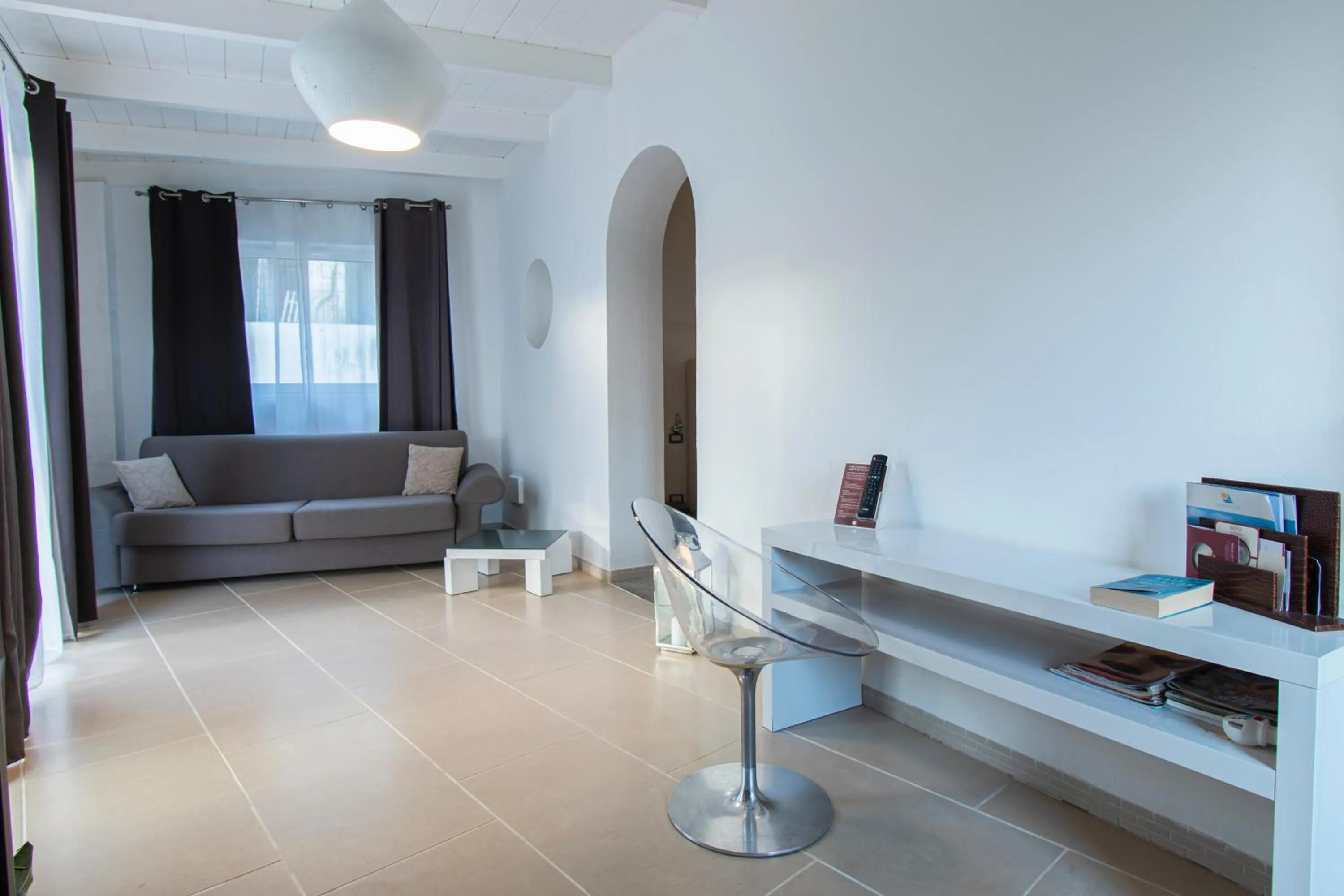 Communal lounge/ TV room in Marina 10 Design Hotel & SPA