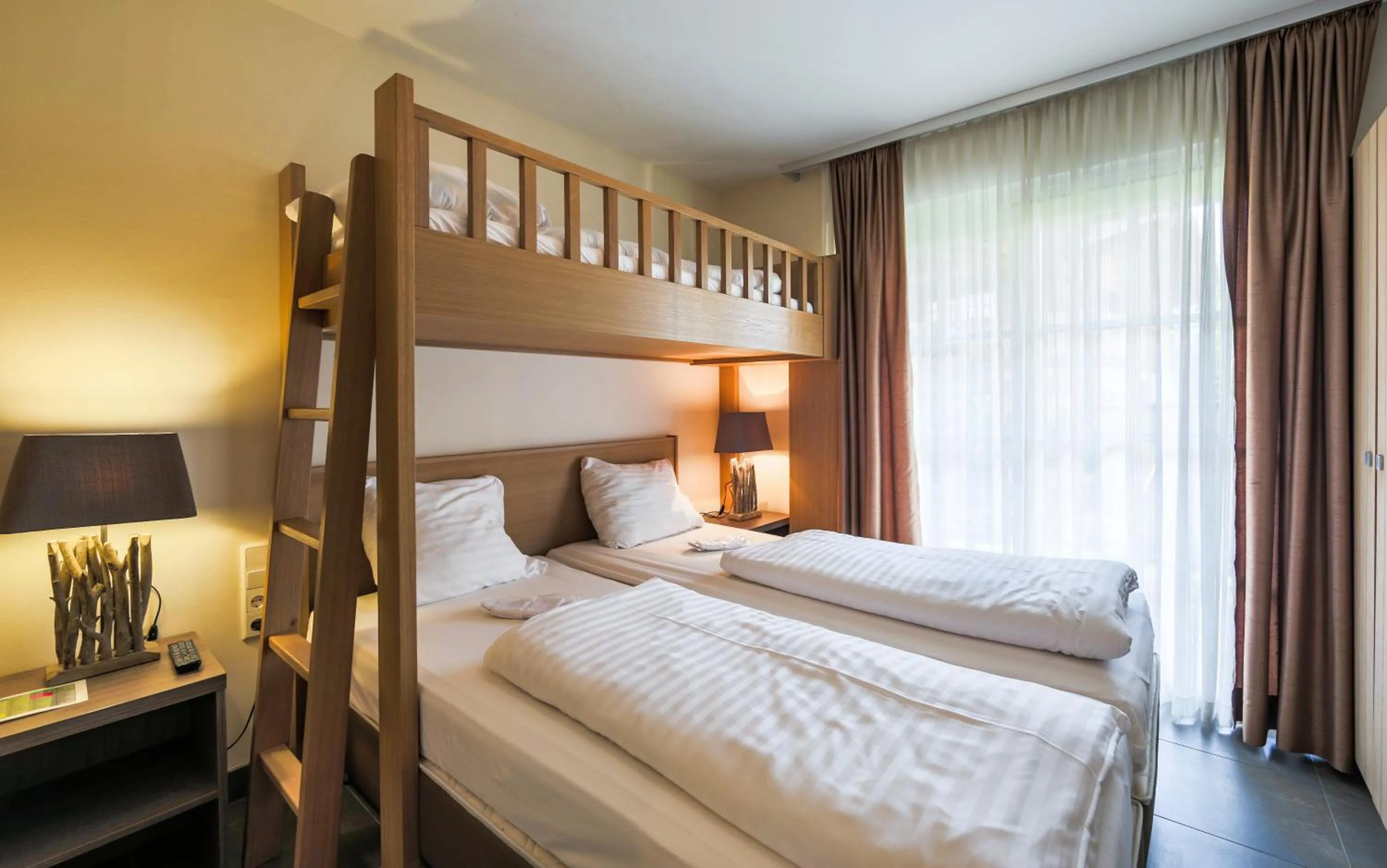 Photo of the whole room, Bed in AvenidA Mountain Resort by Alpin Rentals