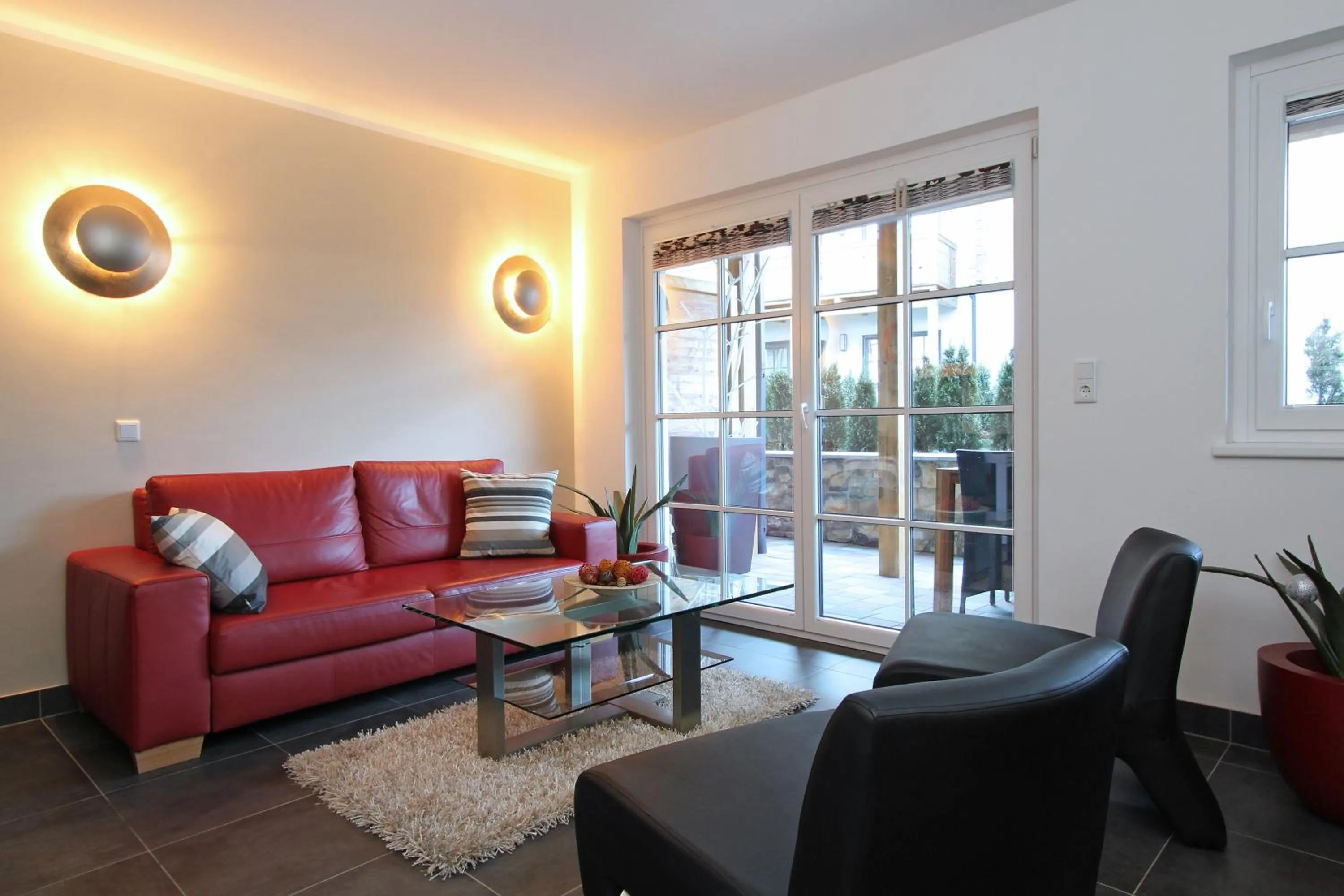 Living room in AvenidA Mountain Resort by Alpin Rentals