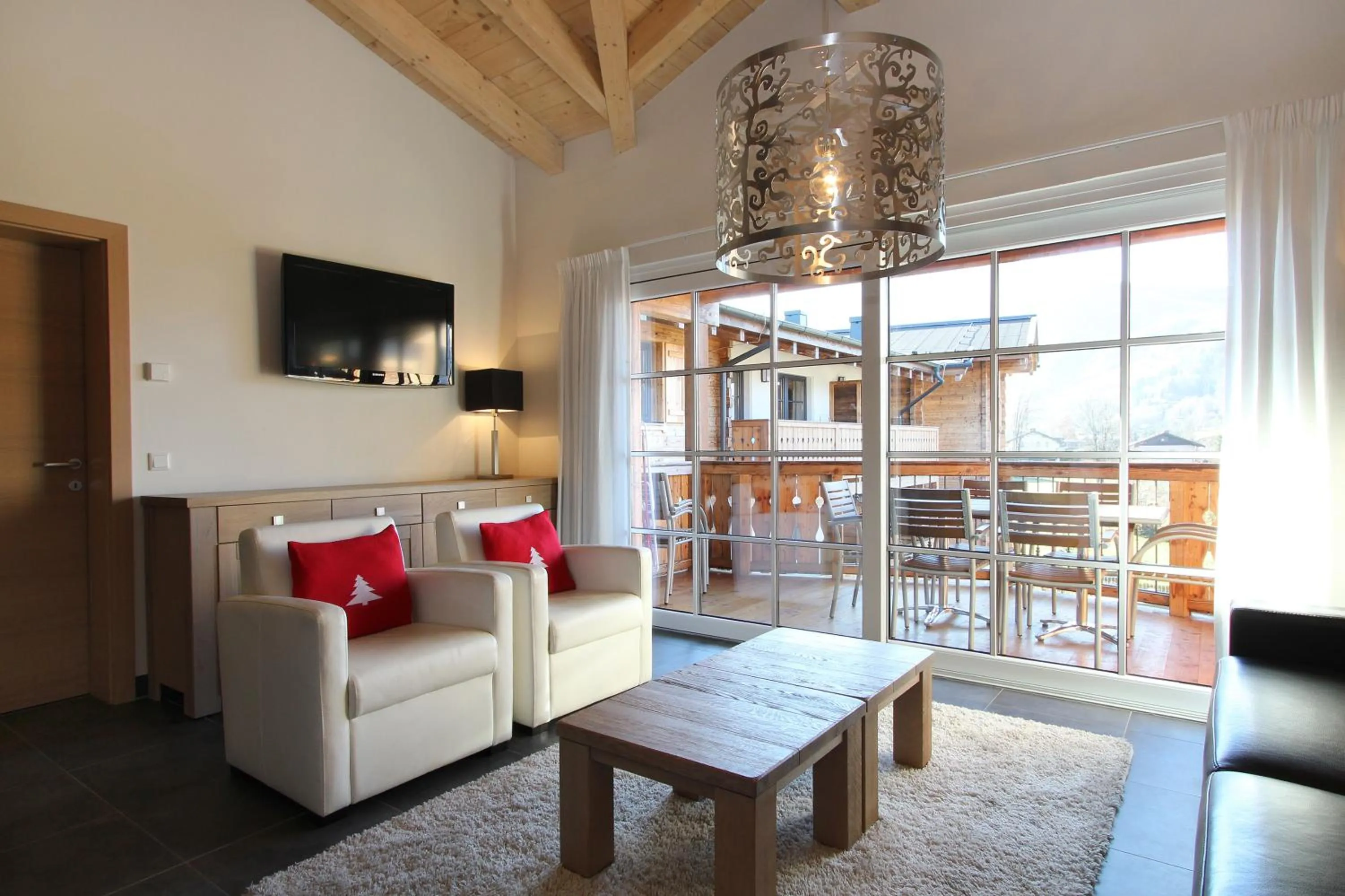 Living room in AvenidA Mountain Resort by Alpin Rentals
