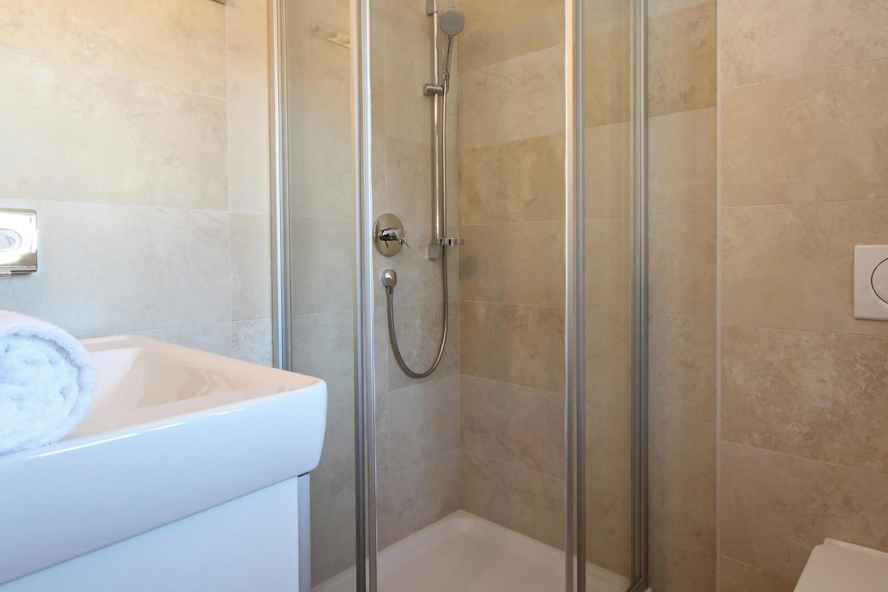 Shower in AvenidA Mountain Resort by Alpin Rentals
