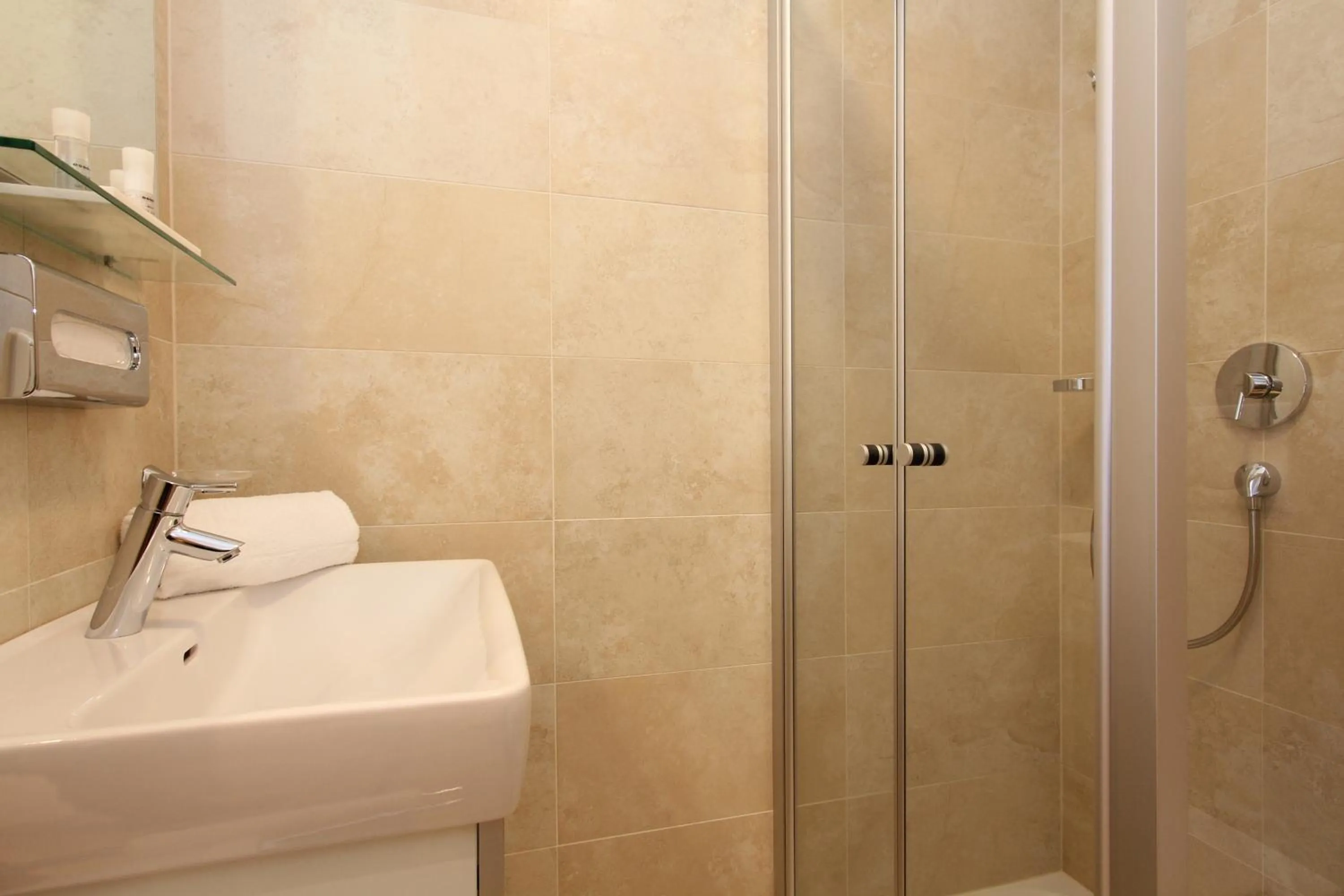 Shower in AvenidA Mountain Resort by Alpin Rentals