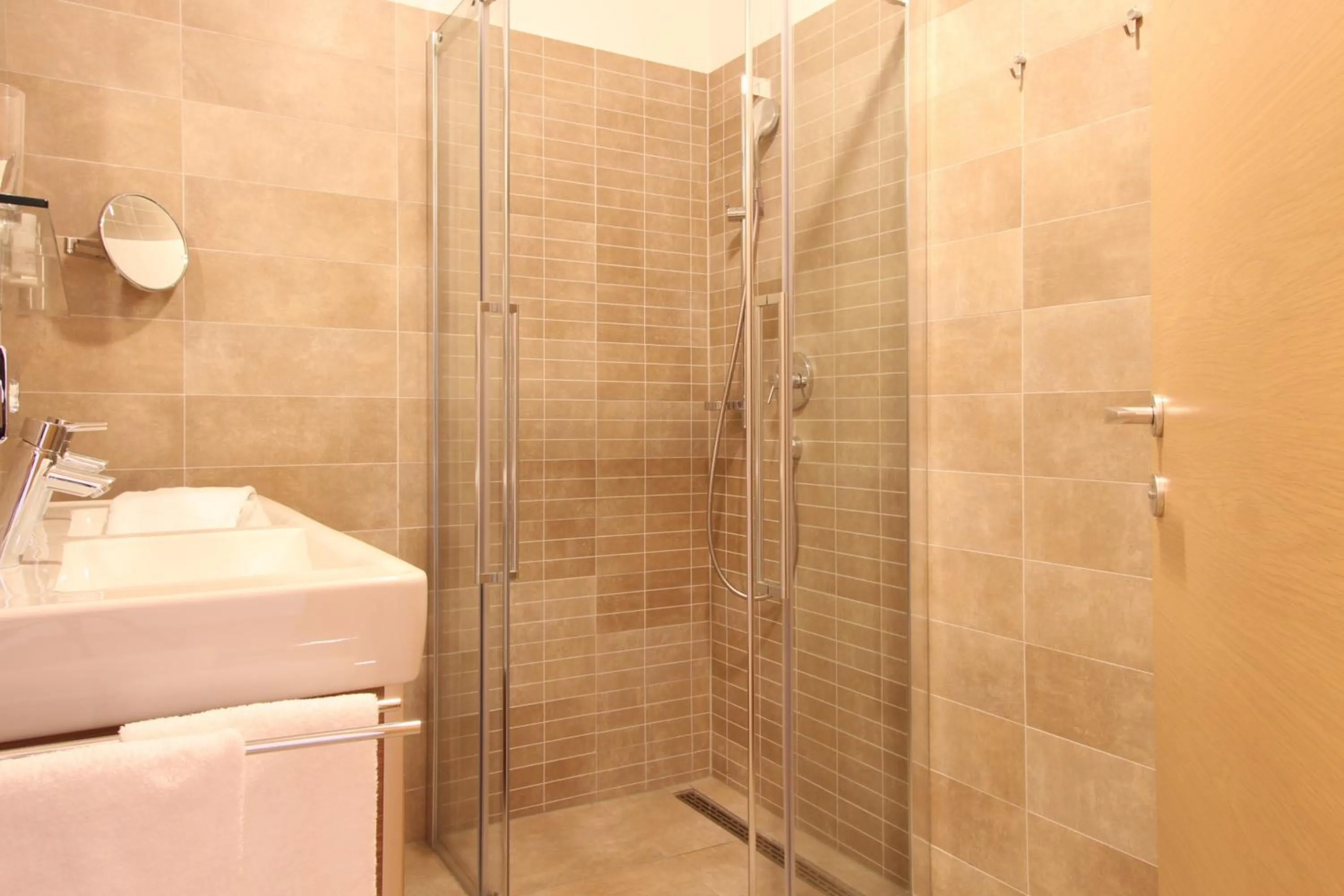 Shower in AvenidA Mountain Resort by Alpin Rentals