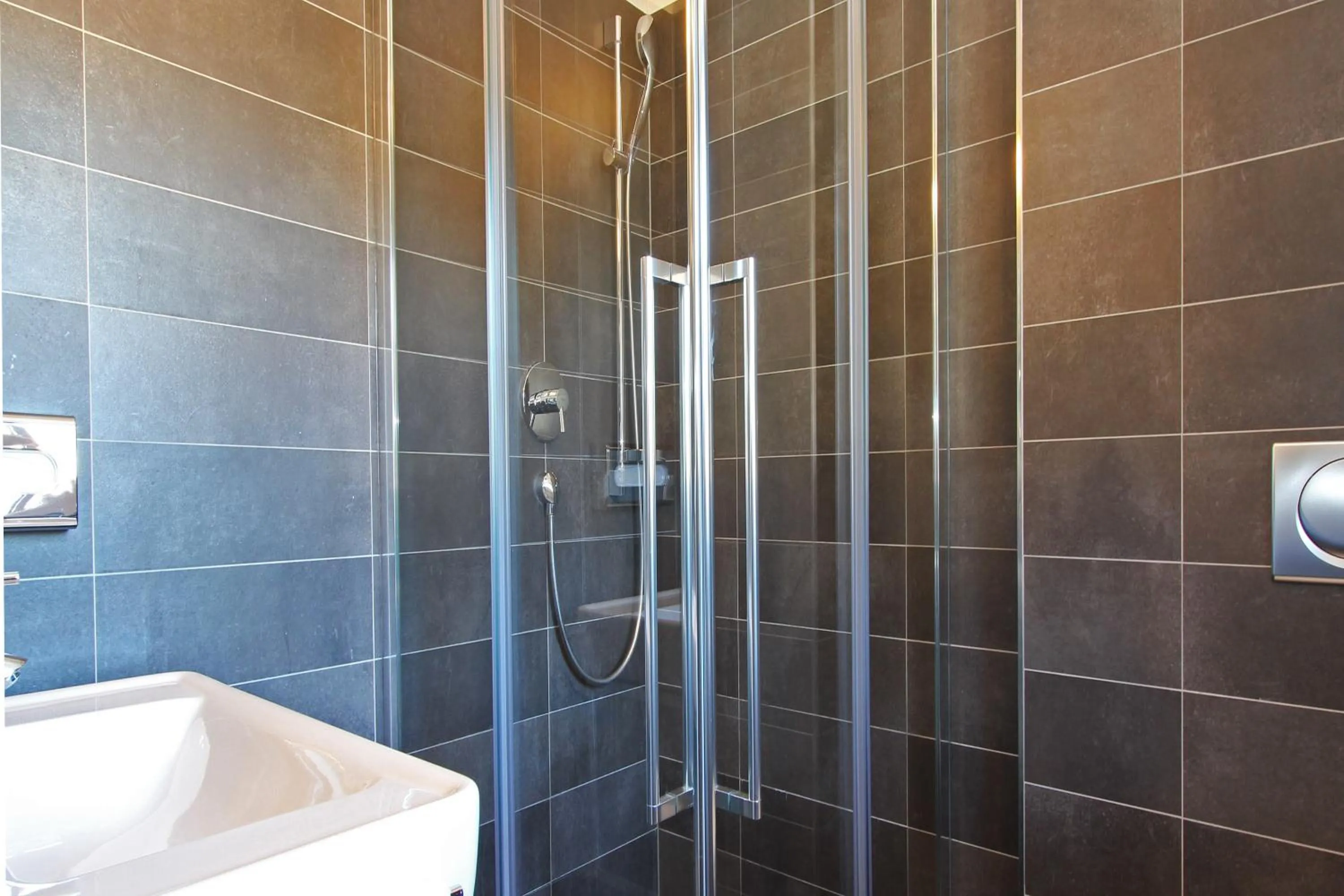 Bathroom in AvenidA Mountain Resort by Alpin Rentals