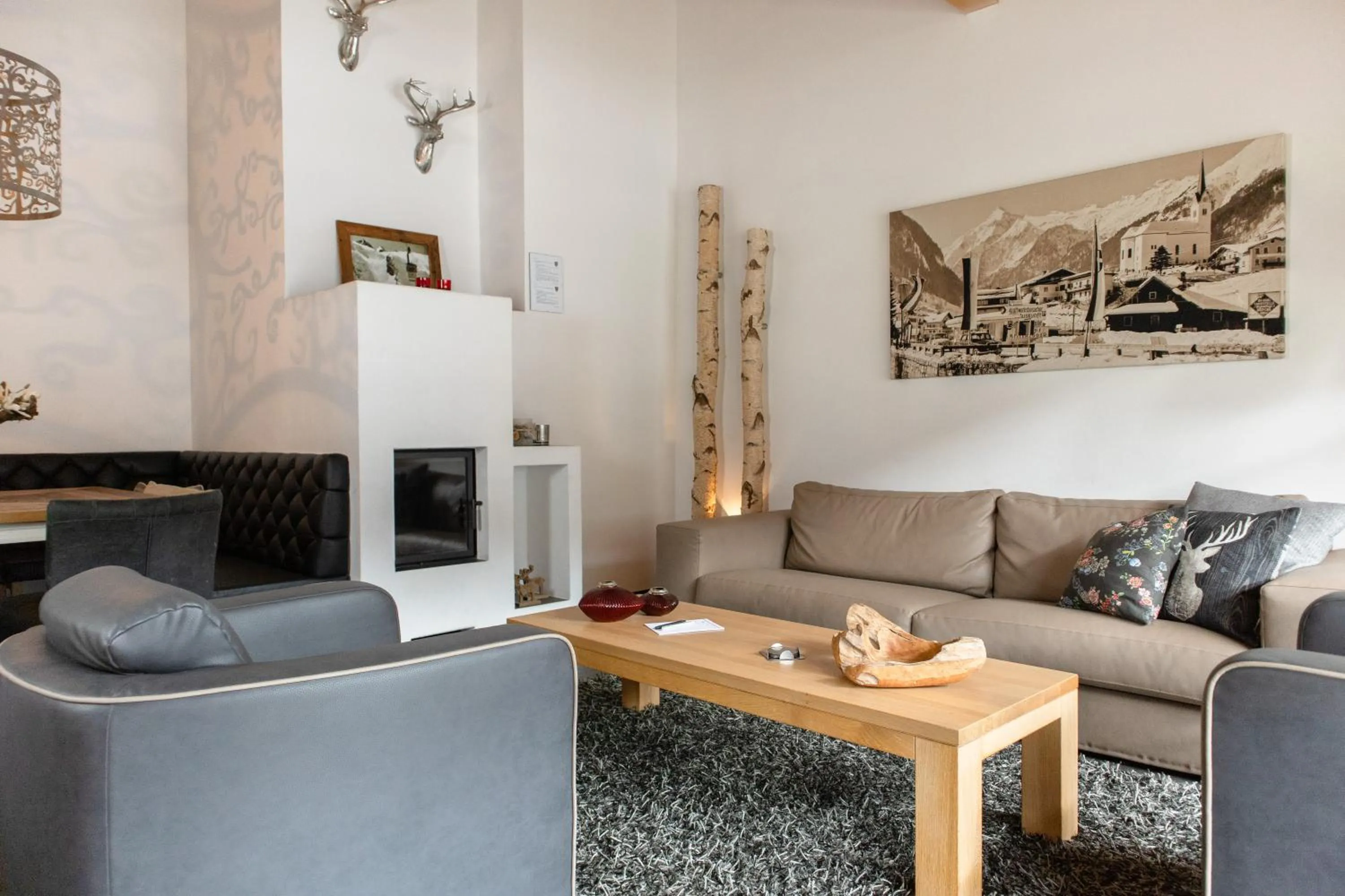 Living room in AvenidA Mountain Resort by Alpin Rentals