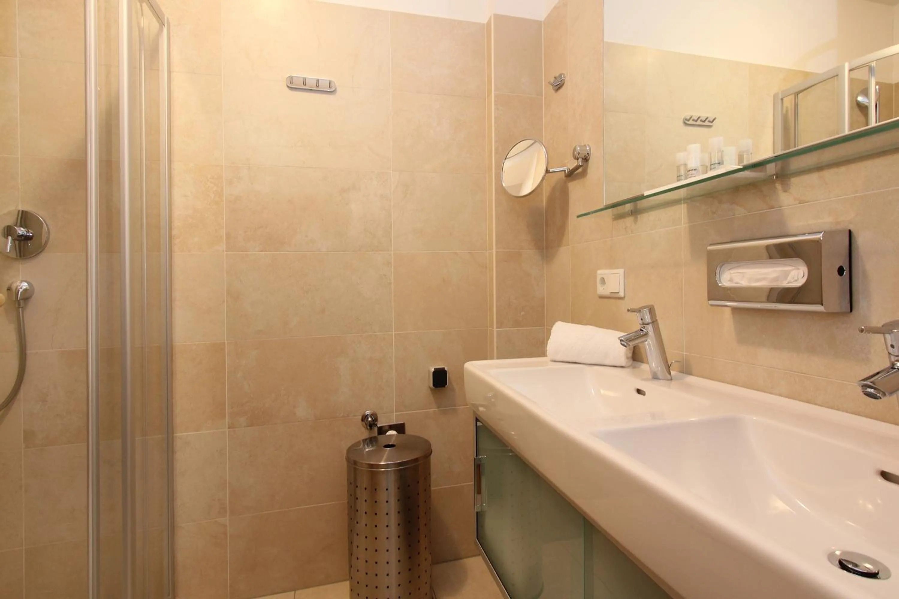 Shower in AvenidA Mountain Resort by Alpin Rentals