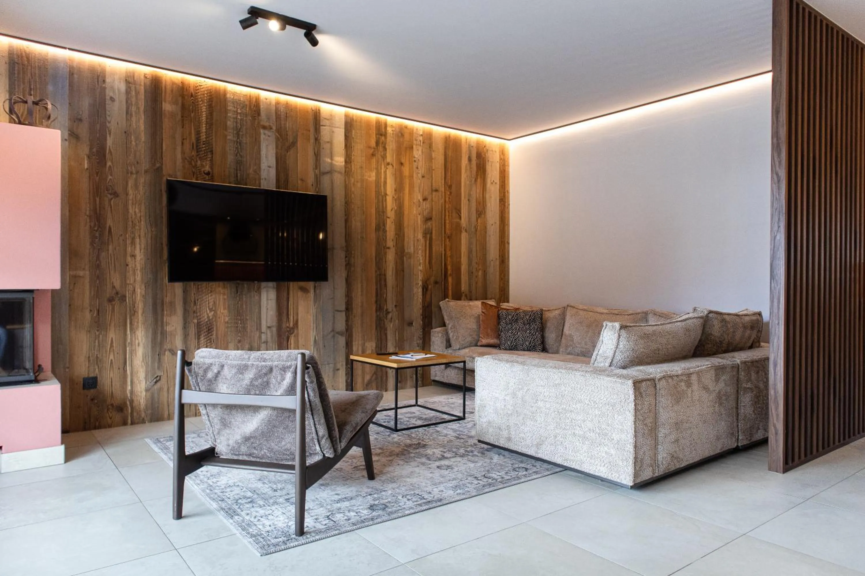 Living room in AvenidA Mountain Resort by Alpin Rentals