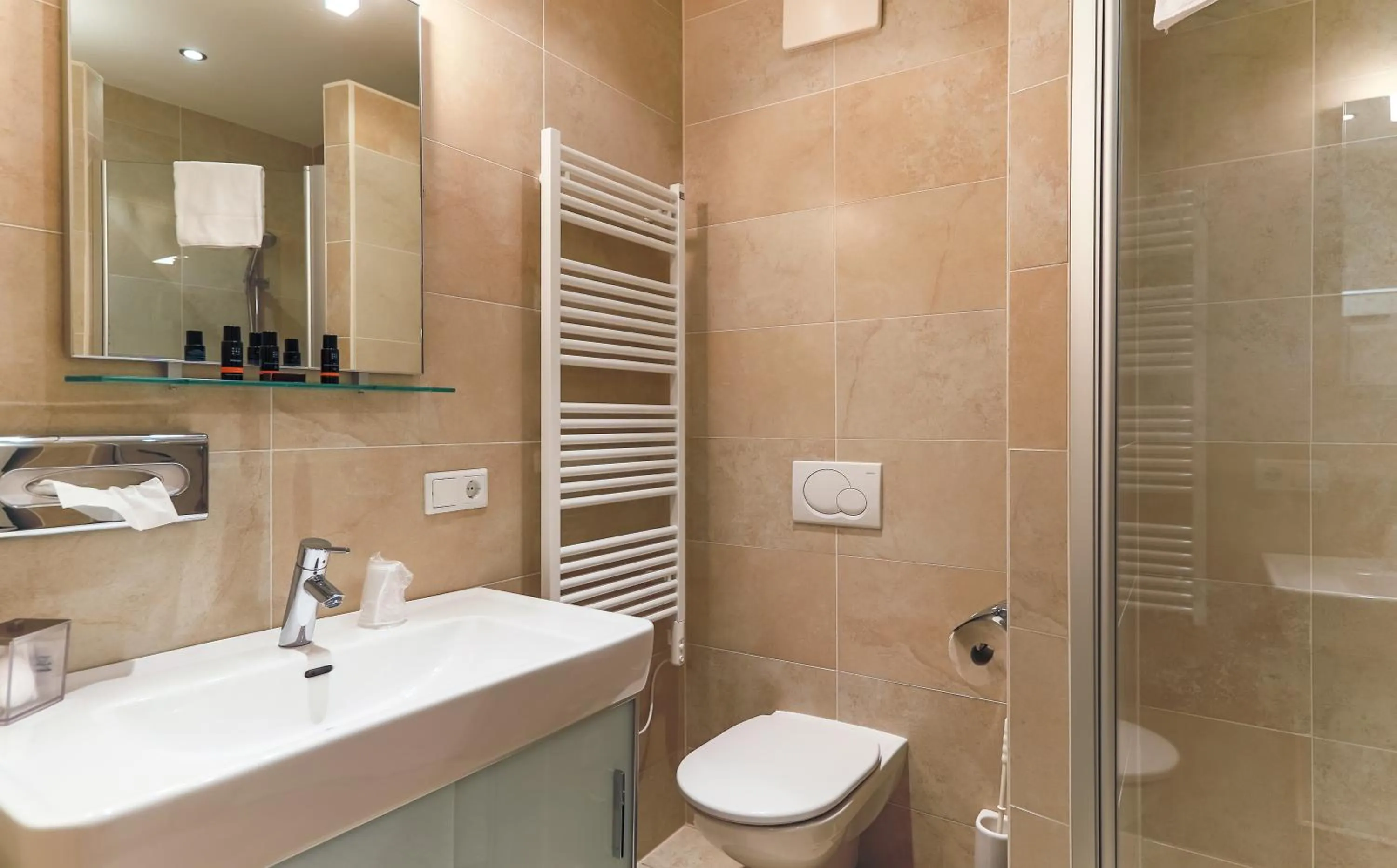 Shower in AvenidA Mountain Resort by Alpin Rentals