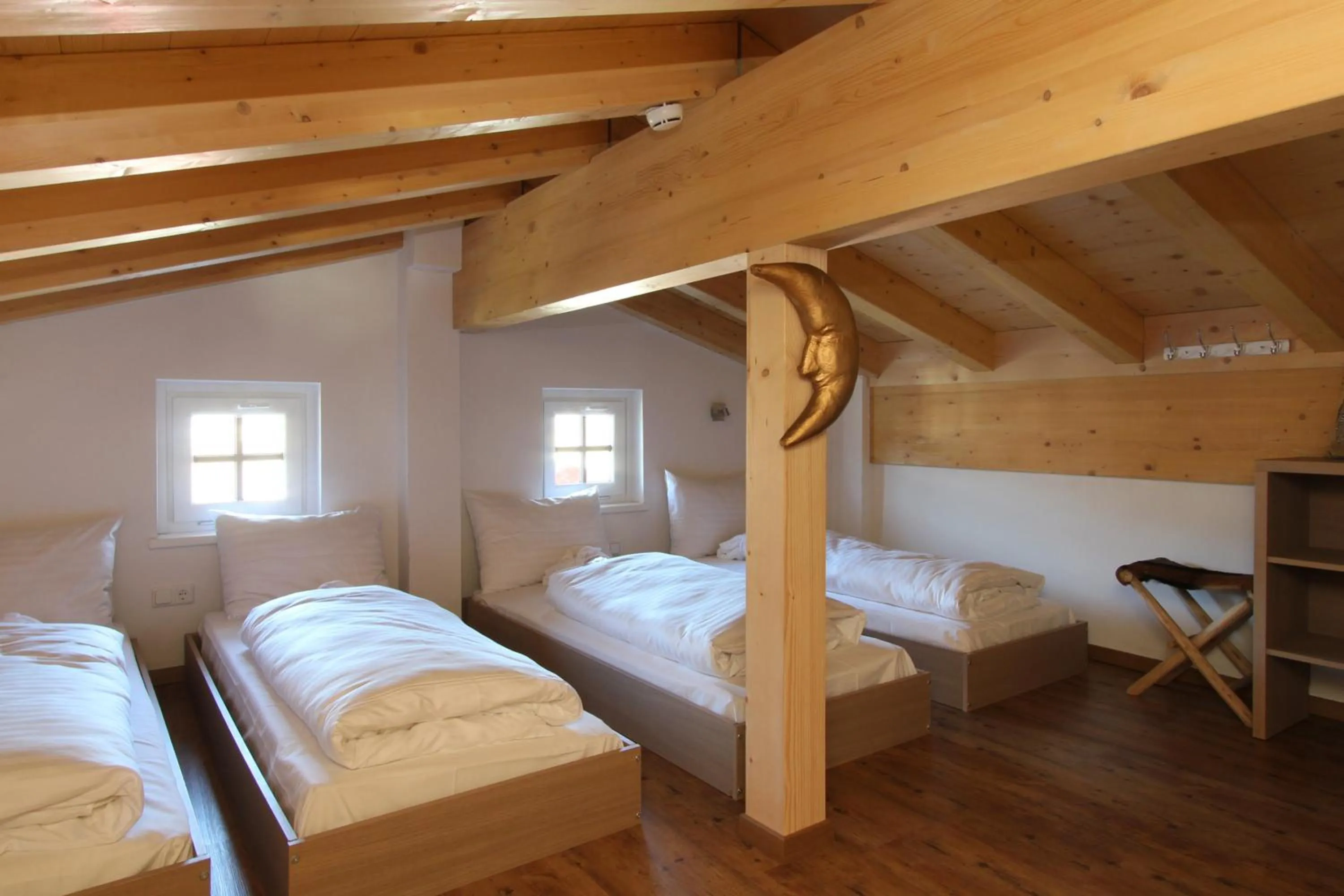 Bed in AvenidA Mountain Resort by Alpin Rentals