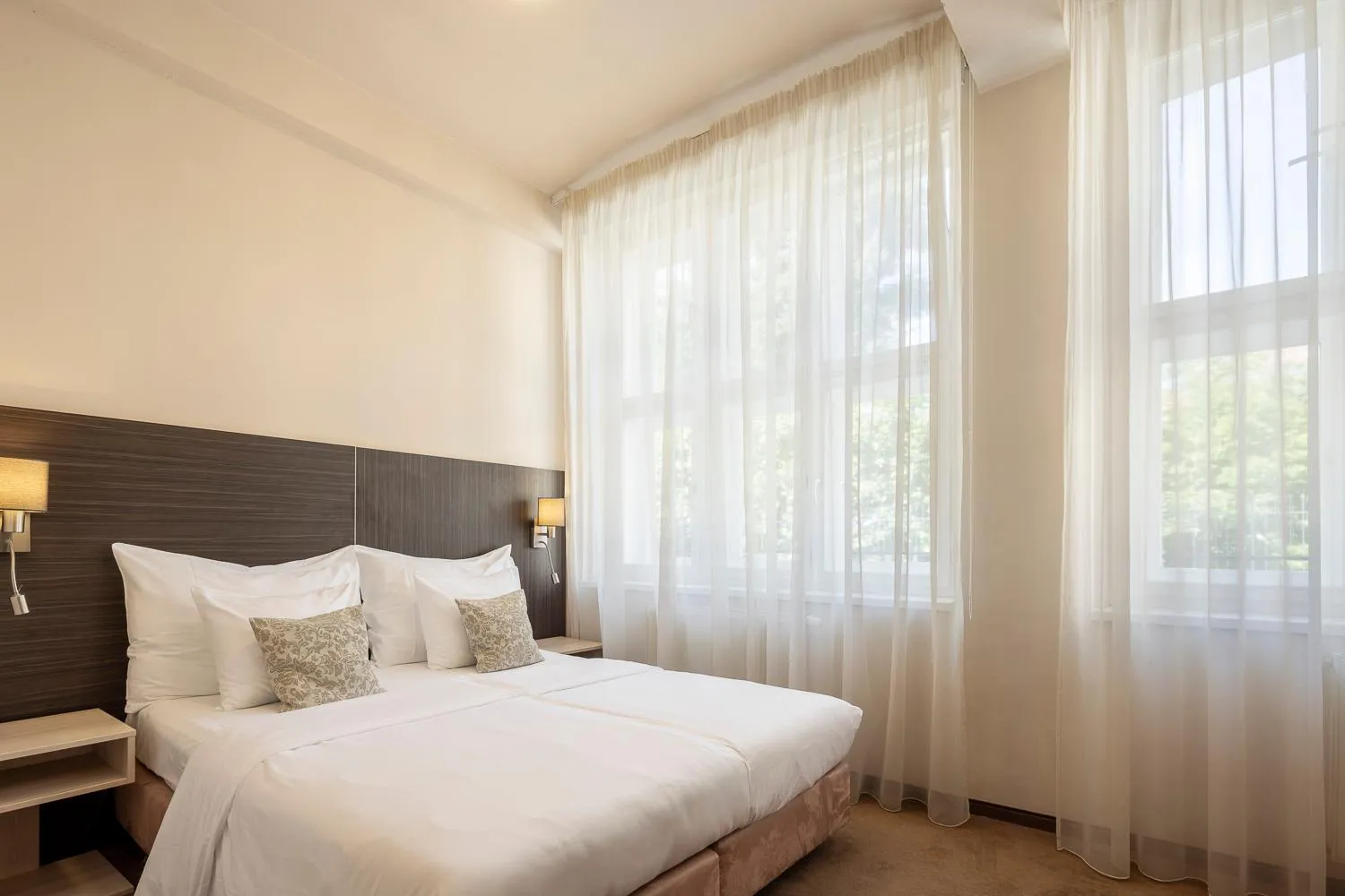 Bed in Pytloun Kampa Garden Hotel Prague