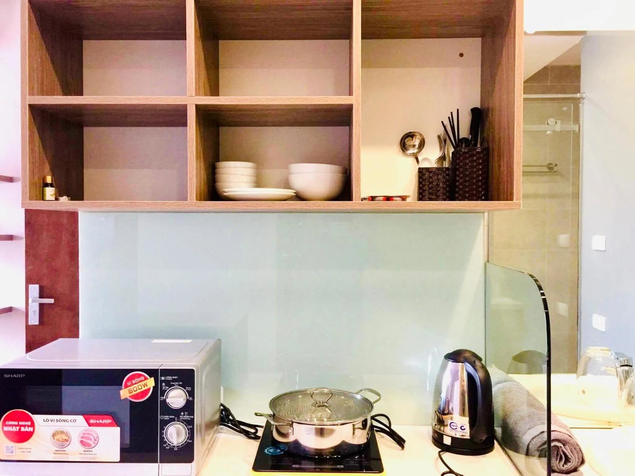 Kitchen or kitchenette in Unique Serviced Apartment