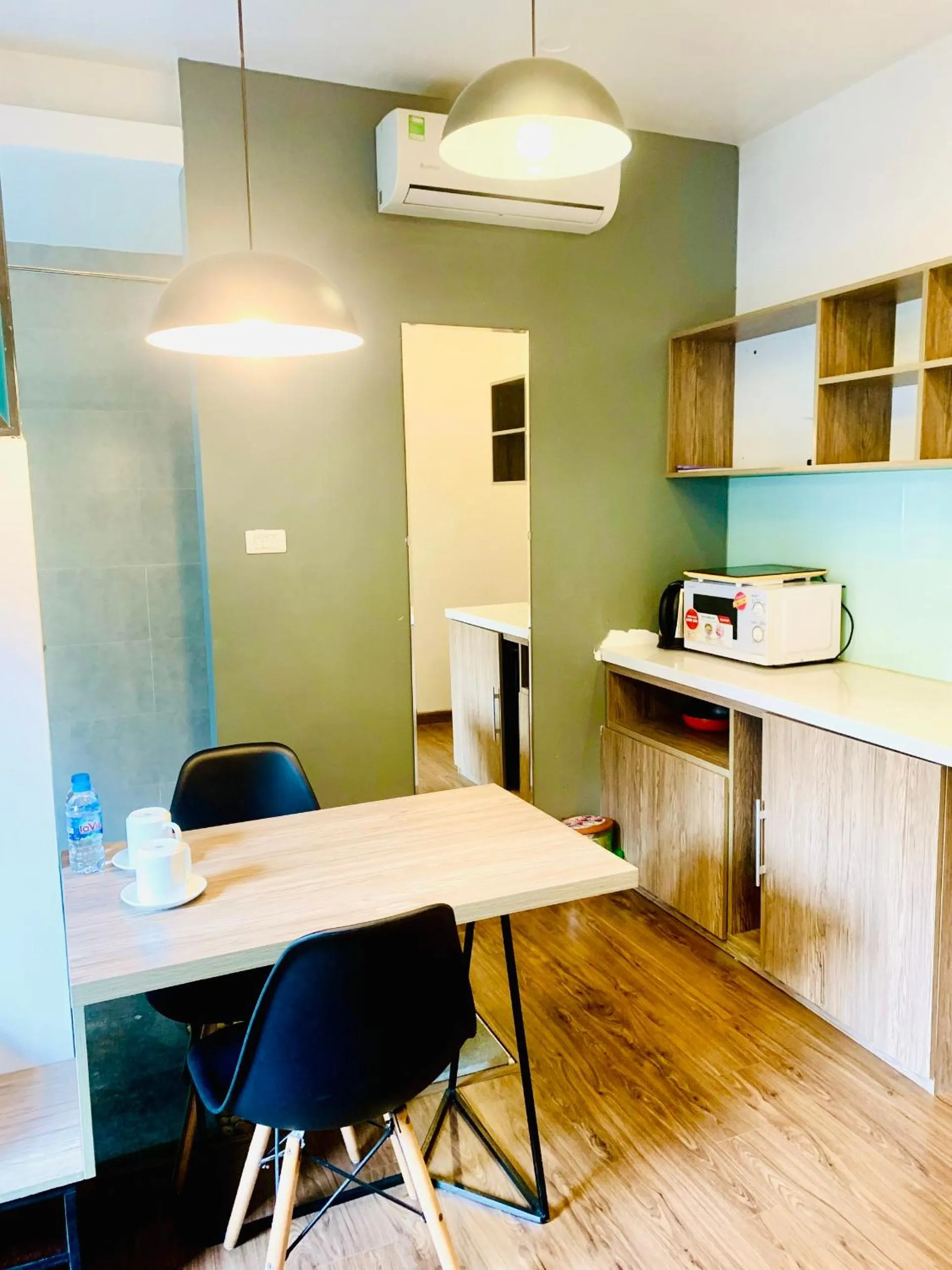 Kitchen or kitchenette in Unique Serviced Apartment