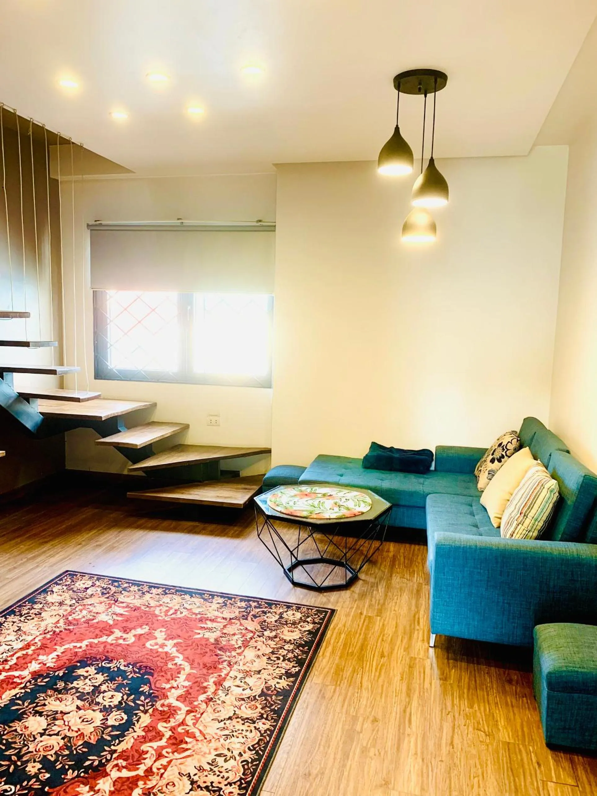 Living room in Unique Serviced Apartment