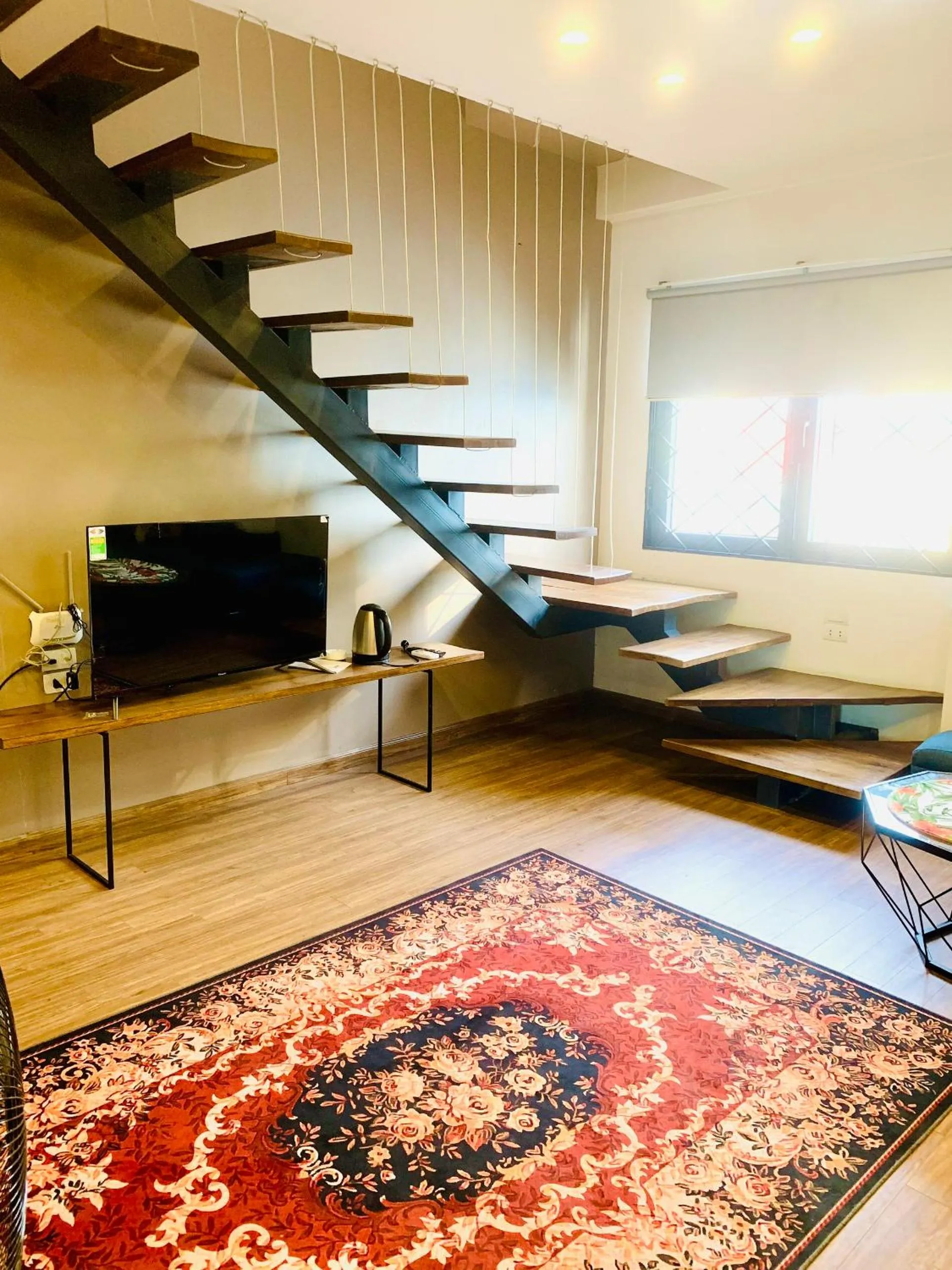 Living room in Unique Serviced Apartment