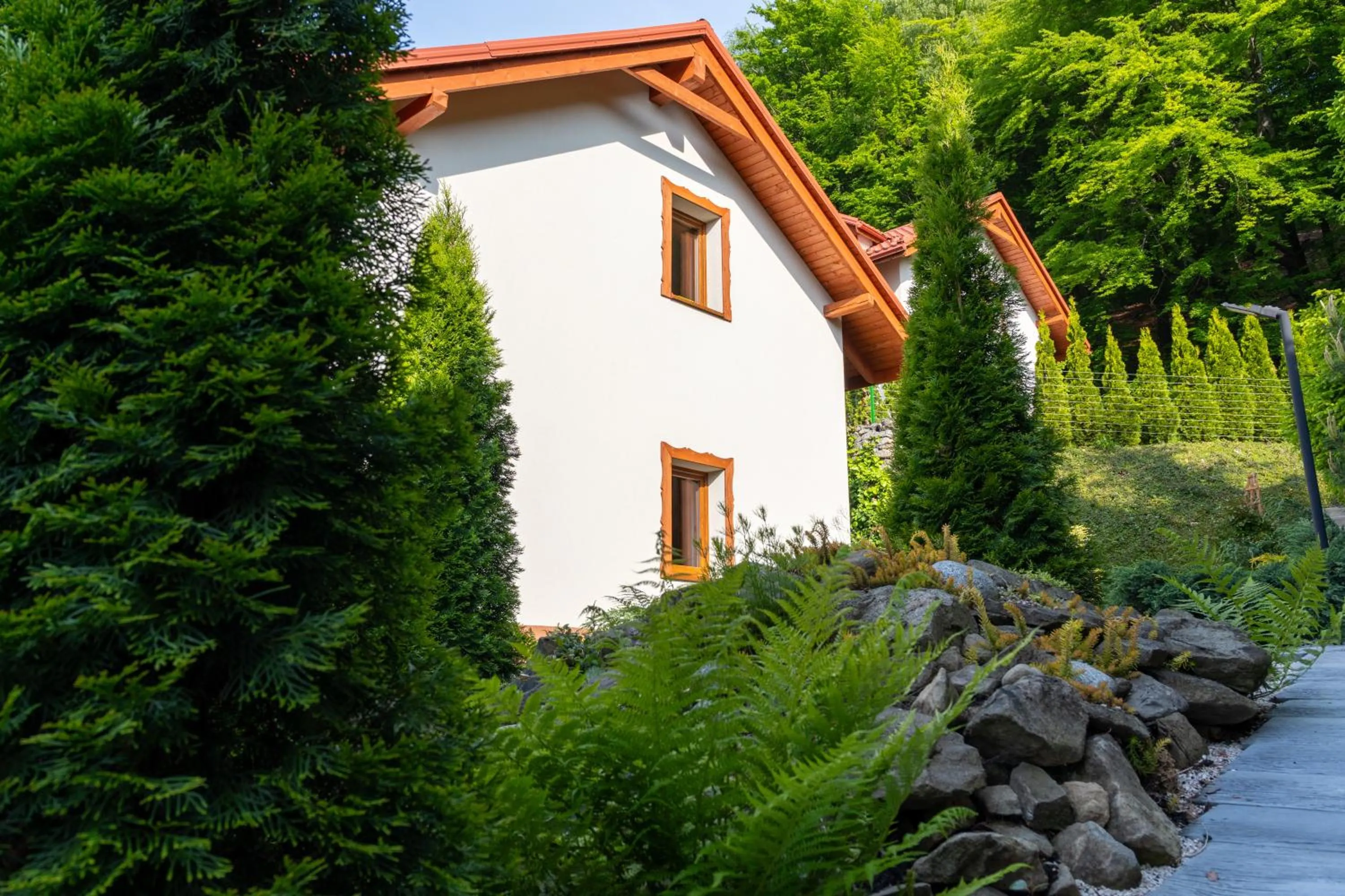 Property building in Willa i Wzgórze Jerrego Apartamenty i pokoje z widokiem na góry