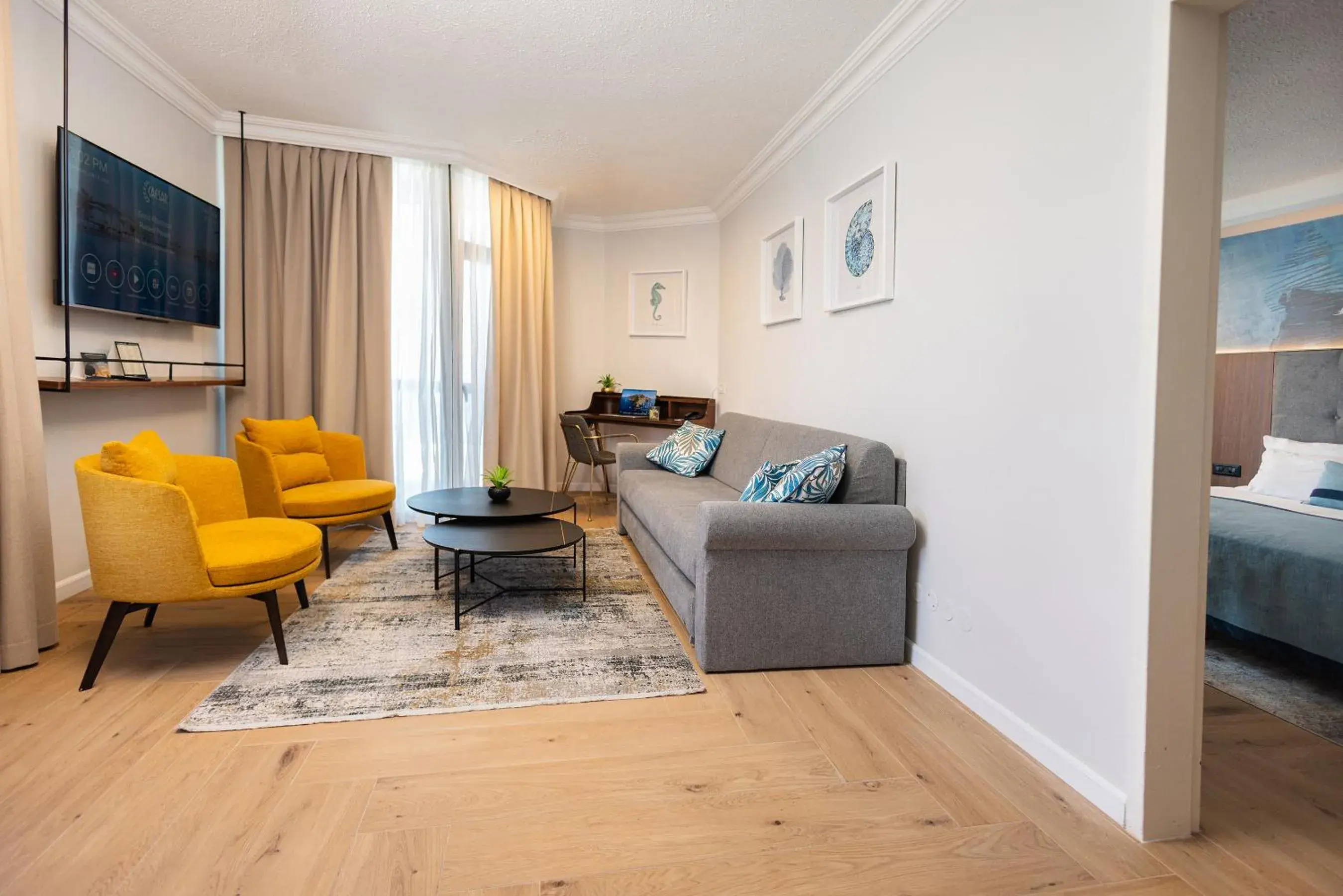 Living room, Bed in Caesar Premier Tiberias Hotel Living room, Bed in Caesar Premier Tiberias Hotel