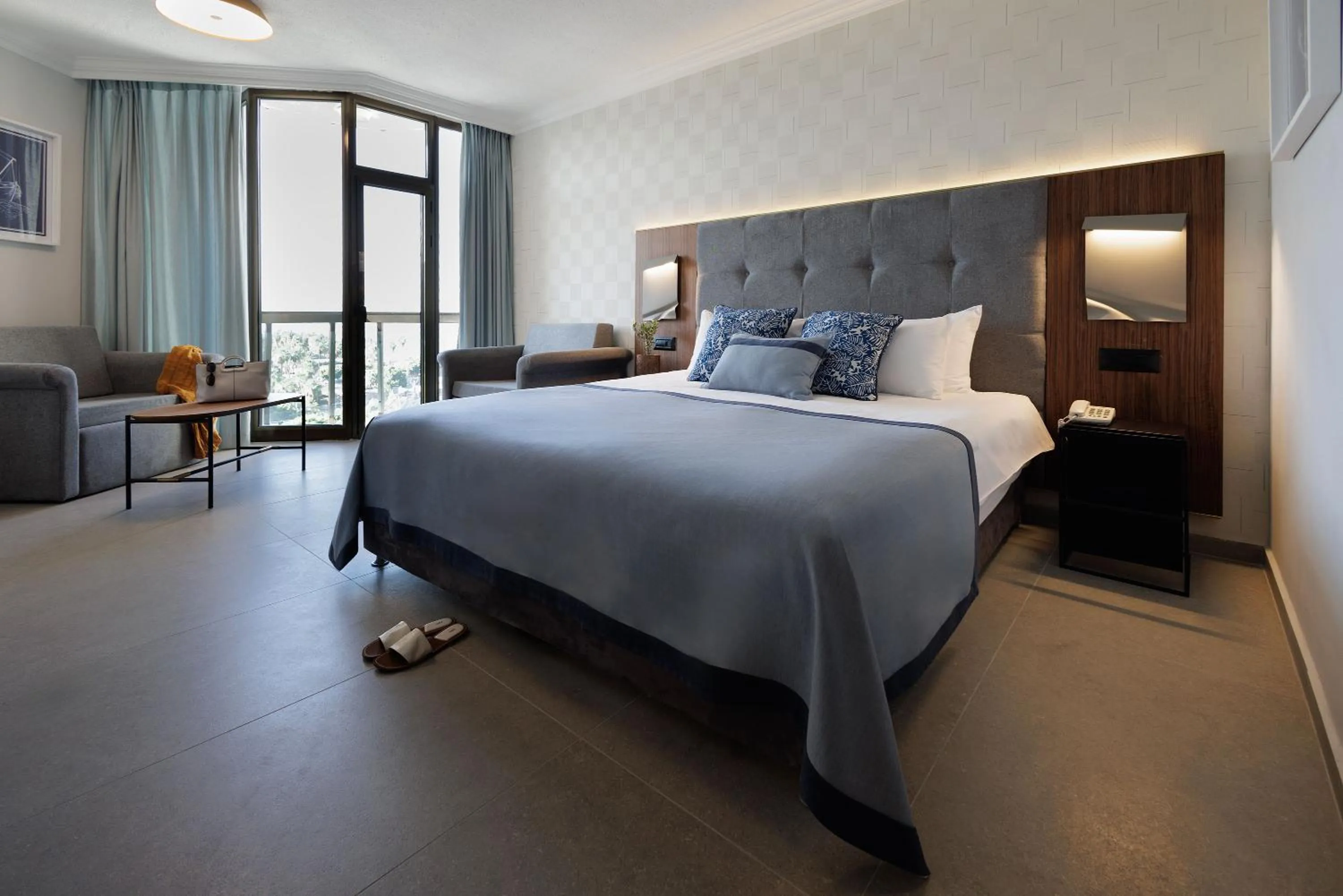 Bed in Caesar Premier Tiberias Hotel