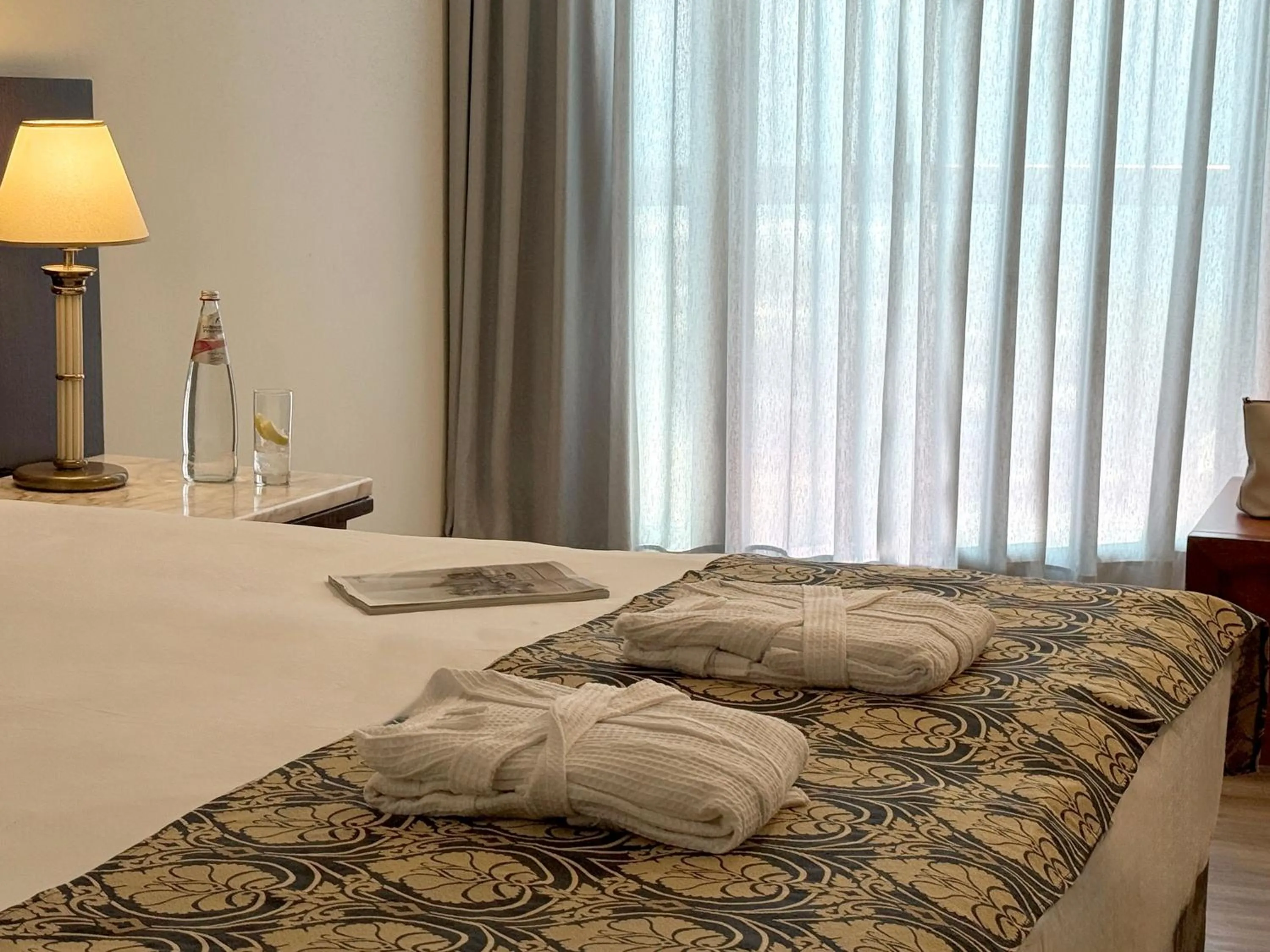 Bed in Caesar Premier Tiberias Hotel