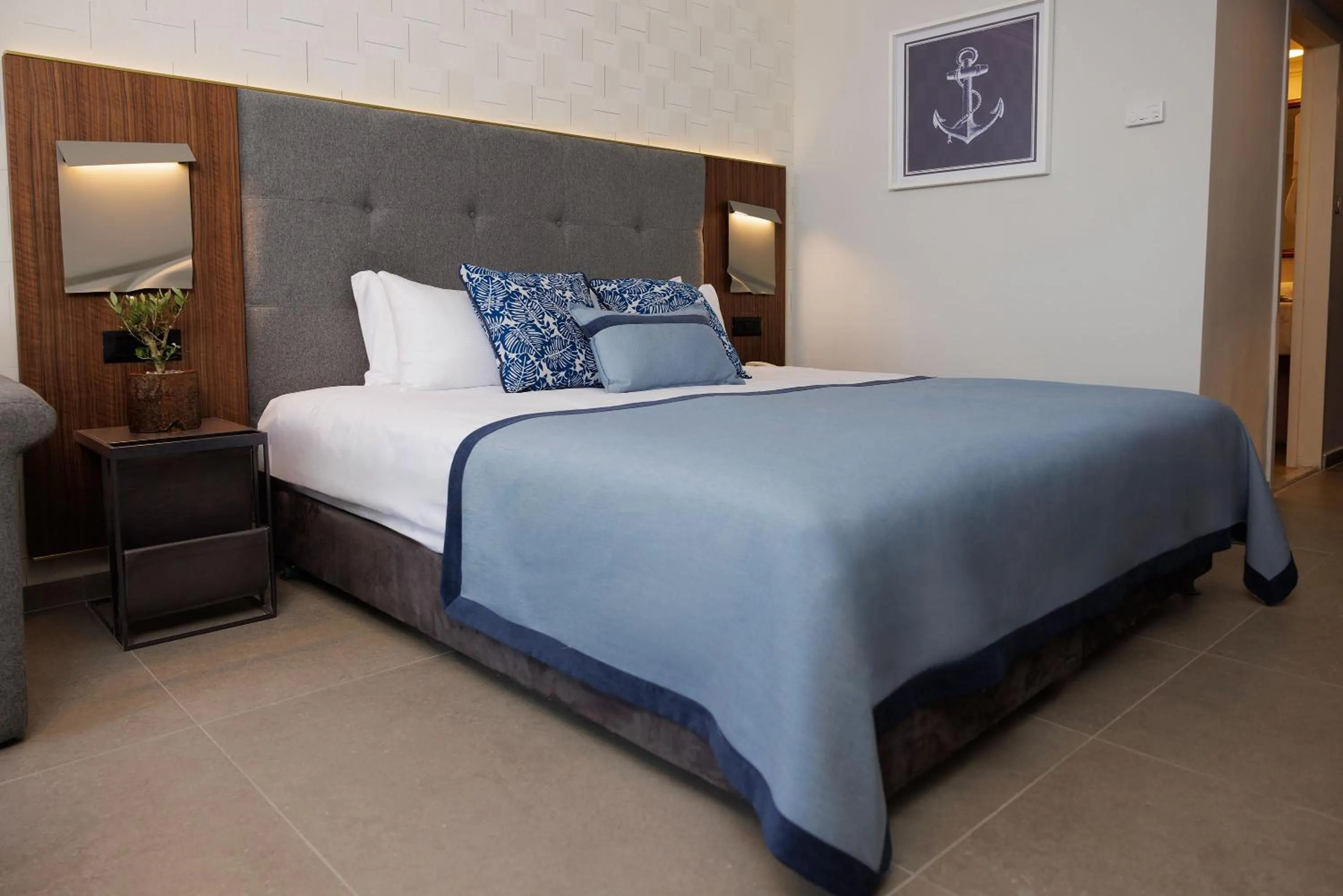 Bed in Caesar Premier Tiberias Hotel