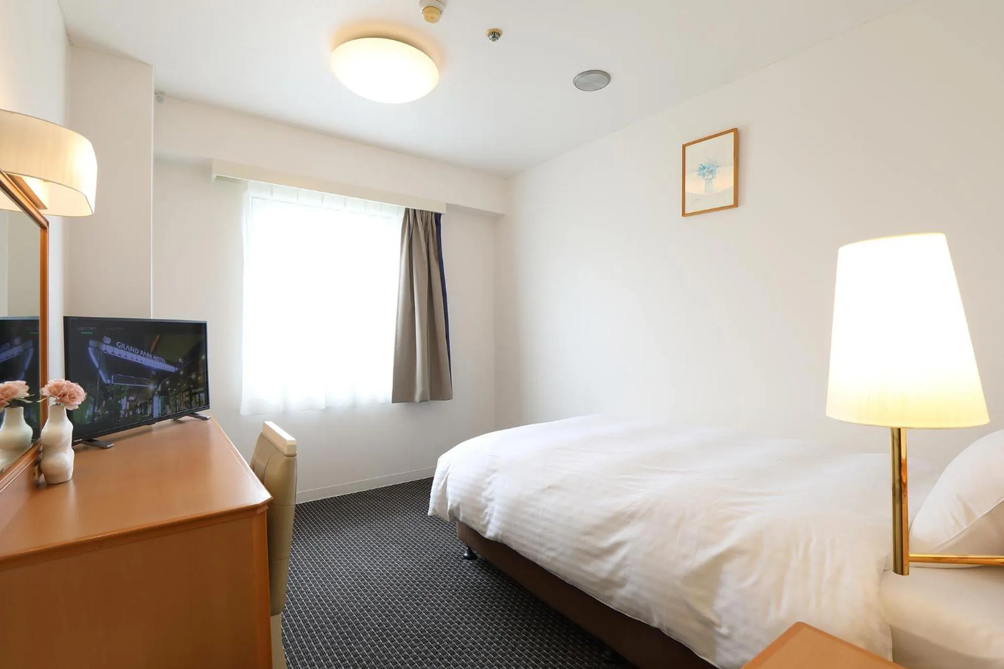 Bed in Grand Park Hotel Panex Iwaki