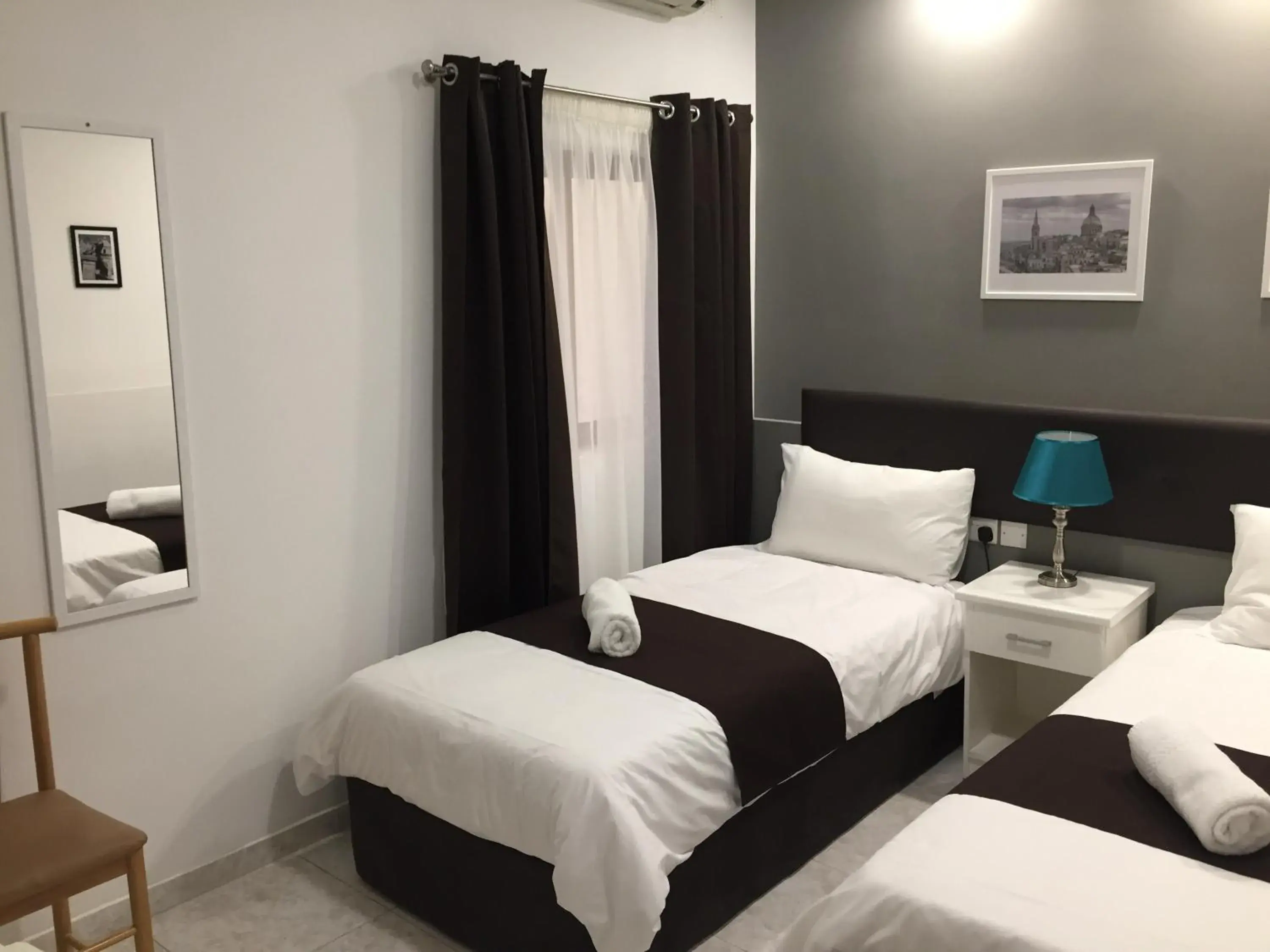 Triple Room in Buccaneers Boutique Guest House Triple Room in Buccaneers Boutique Guest House