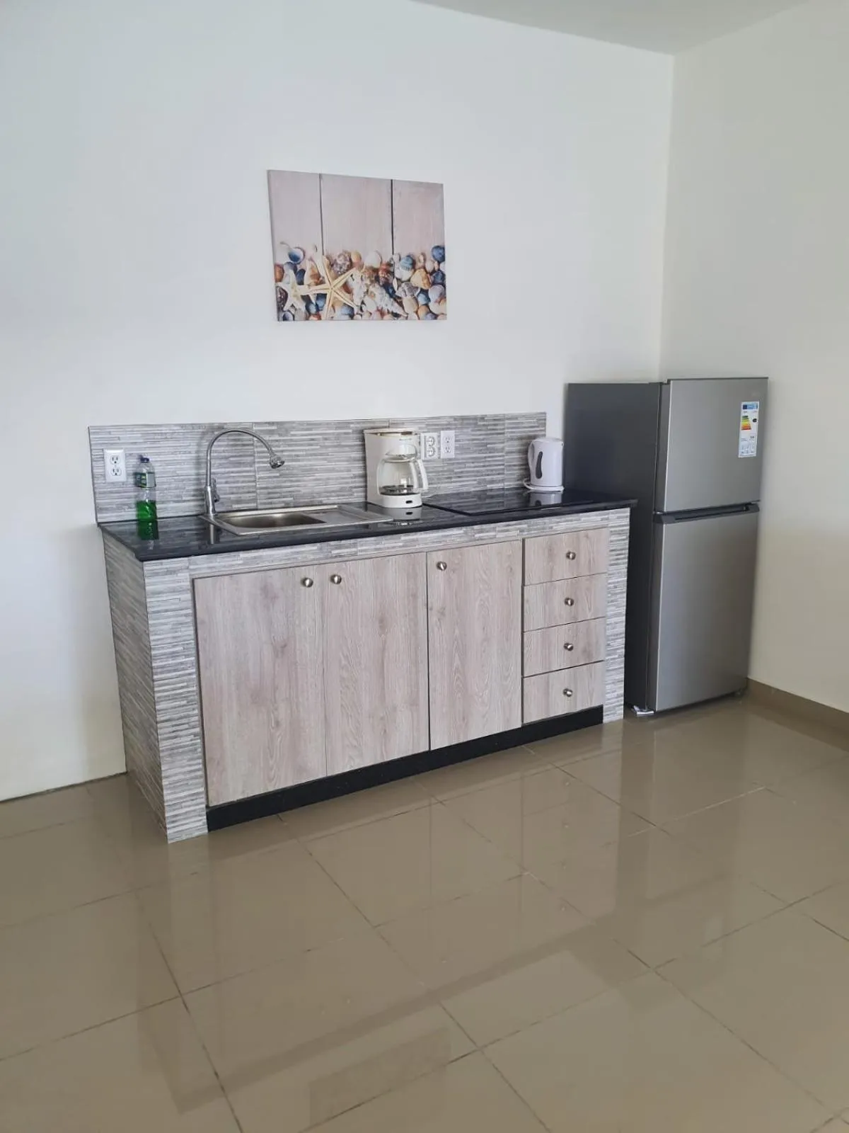 Kitchen or kitchenette in Blue View Apartments