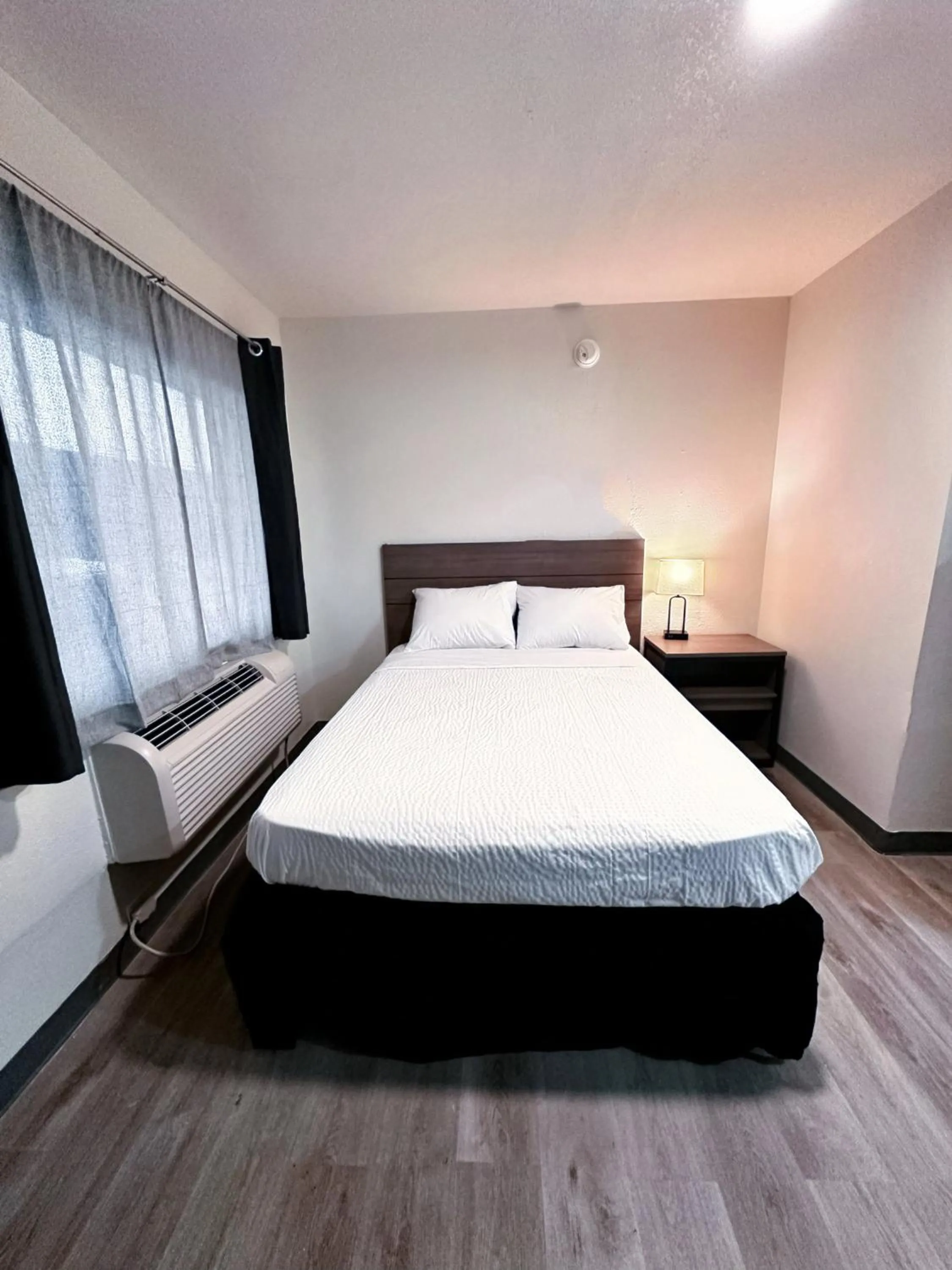 Bed in Studio City Suites, a Travelodge by Wyndham