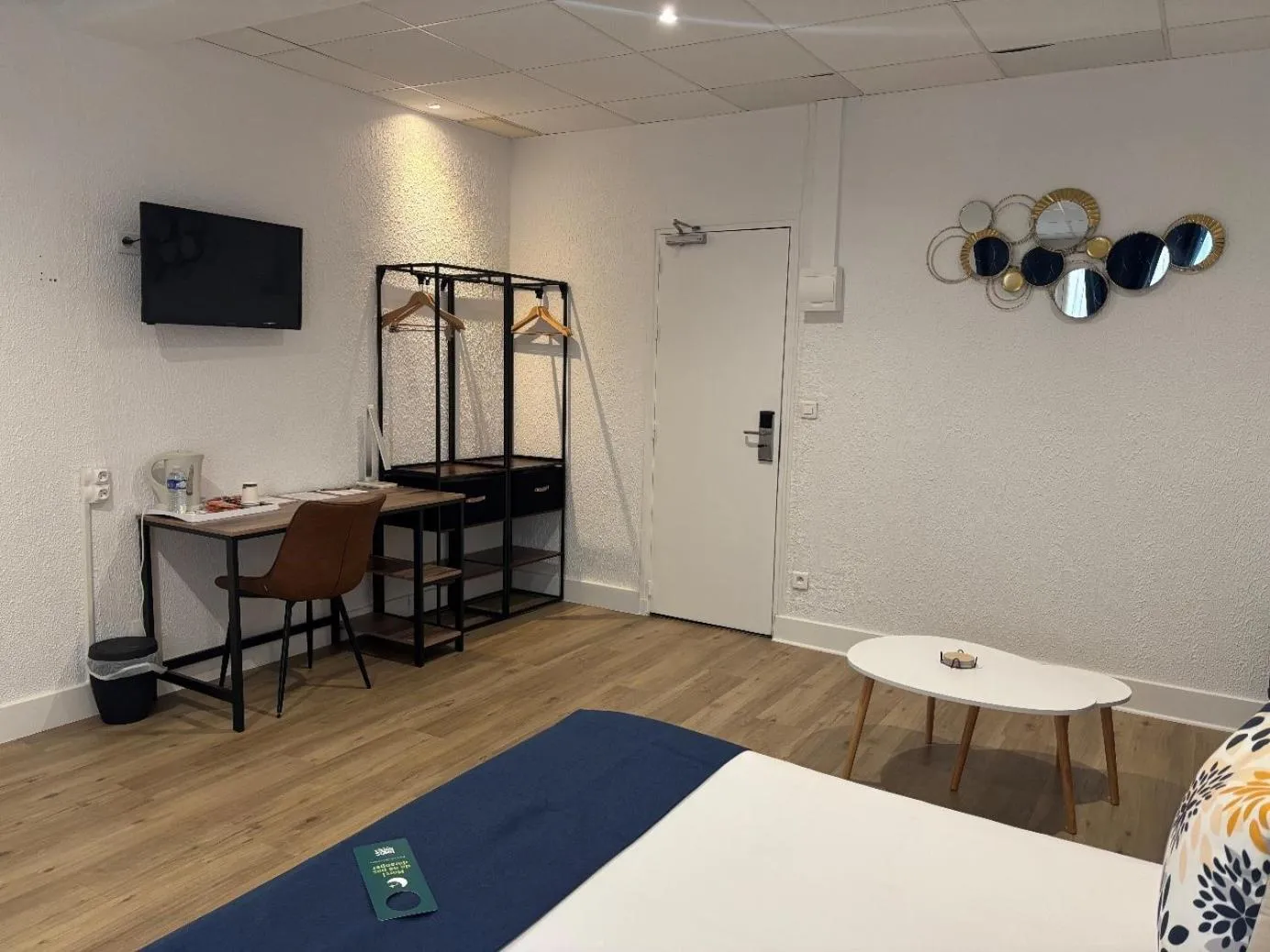 Bed in Logis Hotel Beaudon