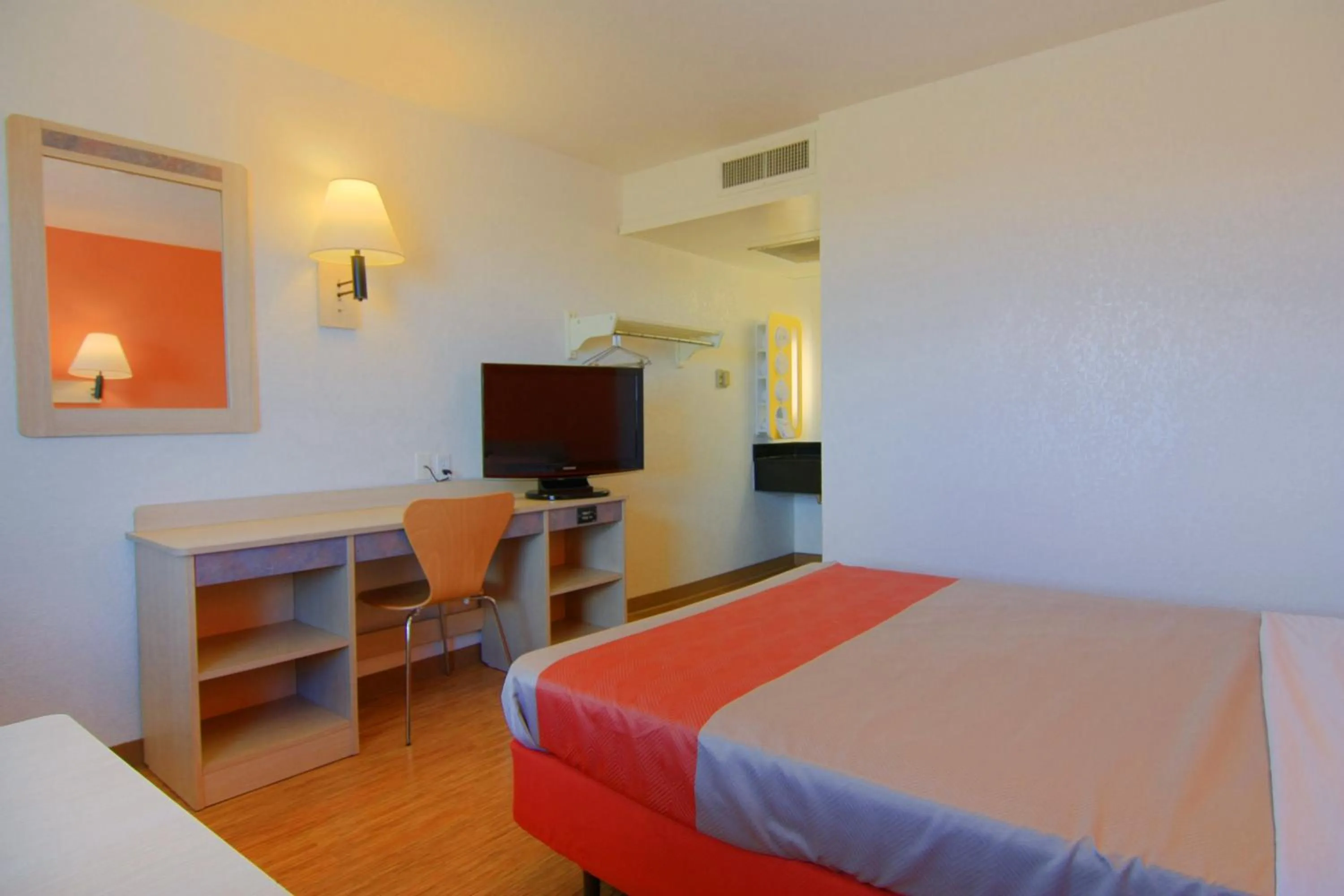 Photo of the whole room, TV/Entertainment Center in Motel 6-Rapid City, SD