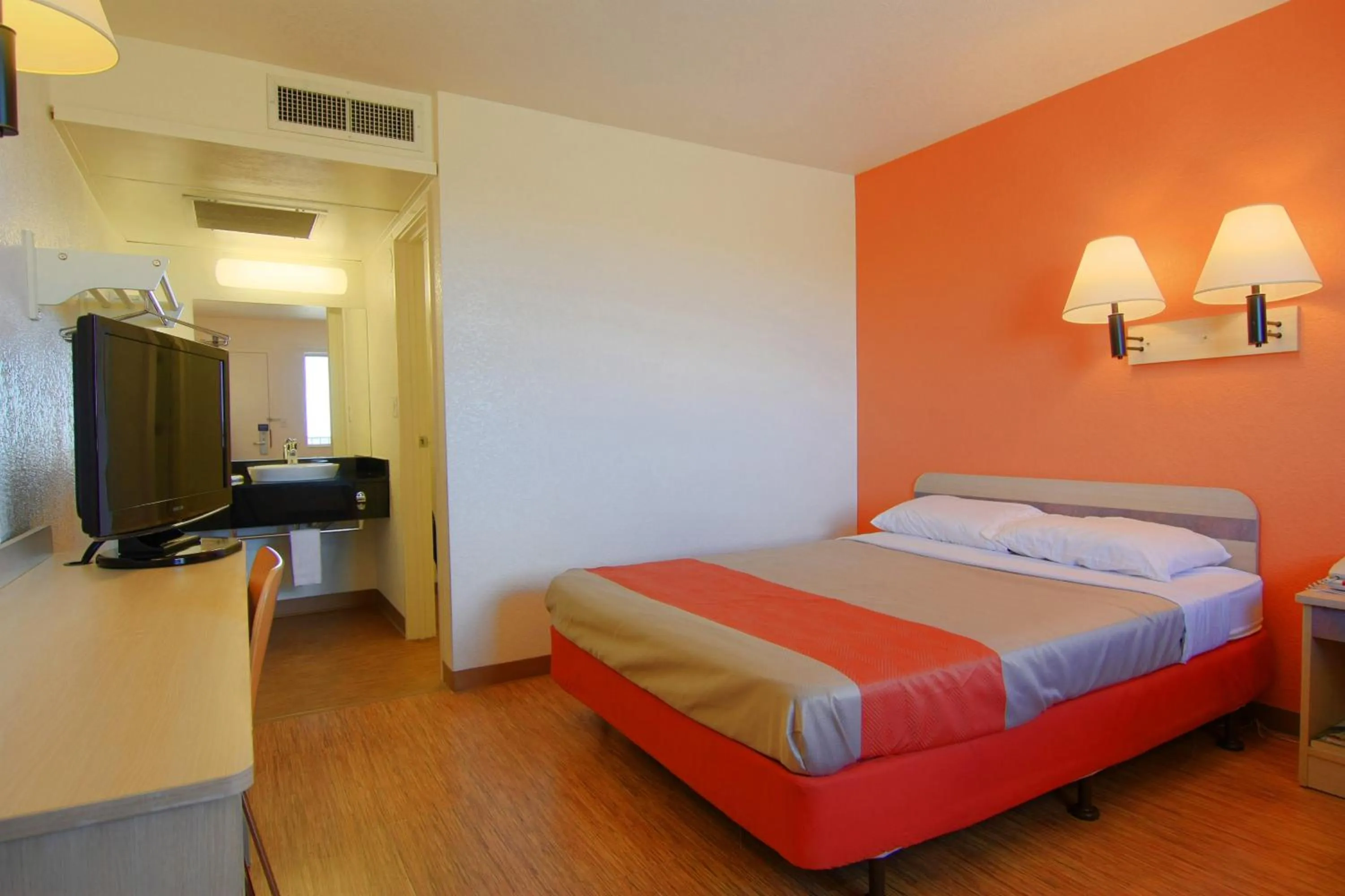 Bed, TV/Entertainment Center in Motel 6-Rapid City, SD