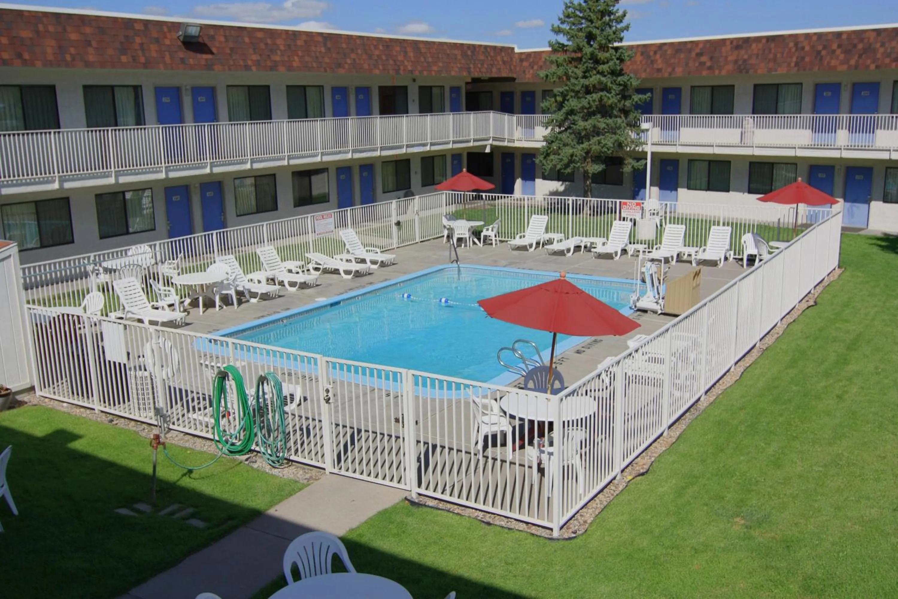 Facade/entrance, Pool View in Motel 6-Rapid City, SD