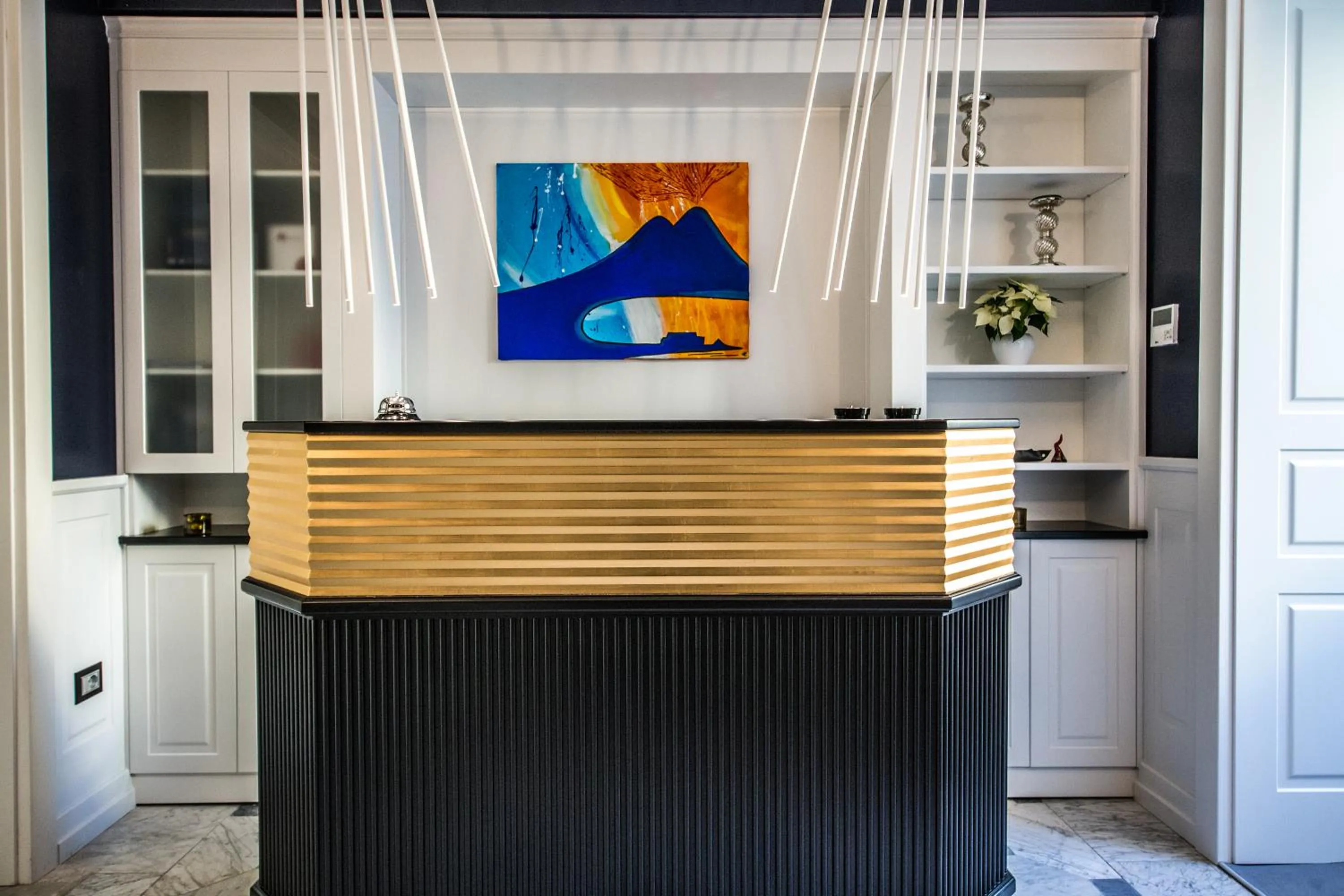 Communal lounge/ TV room in Relais Piazza Vittoria