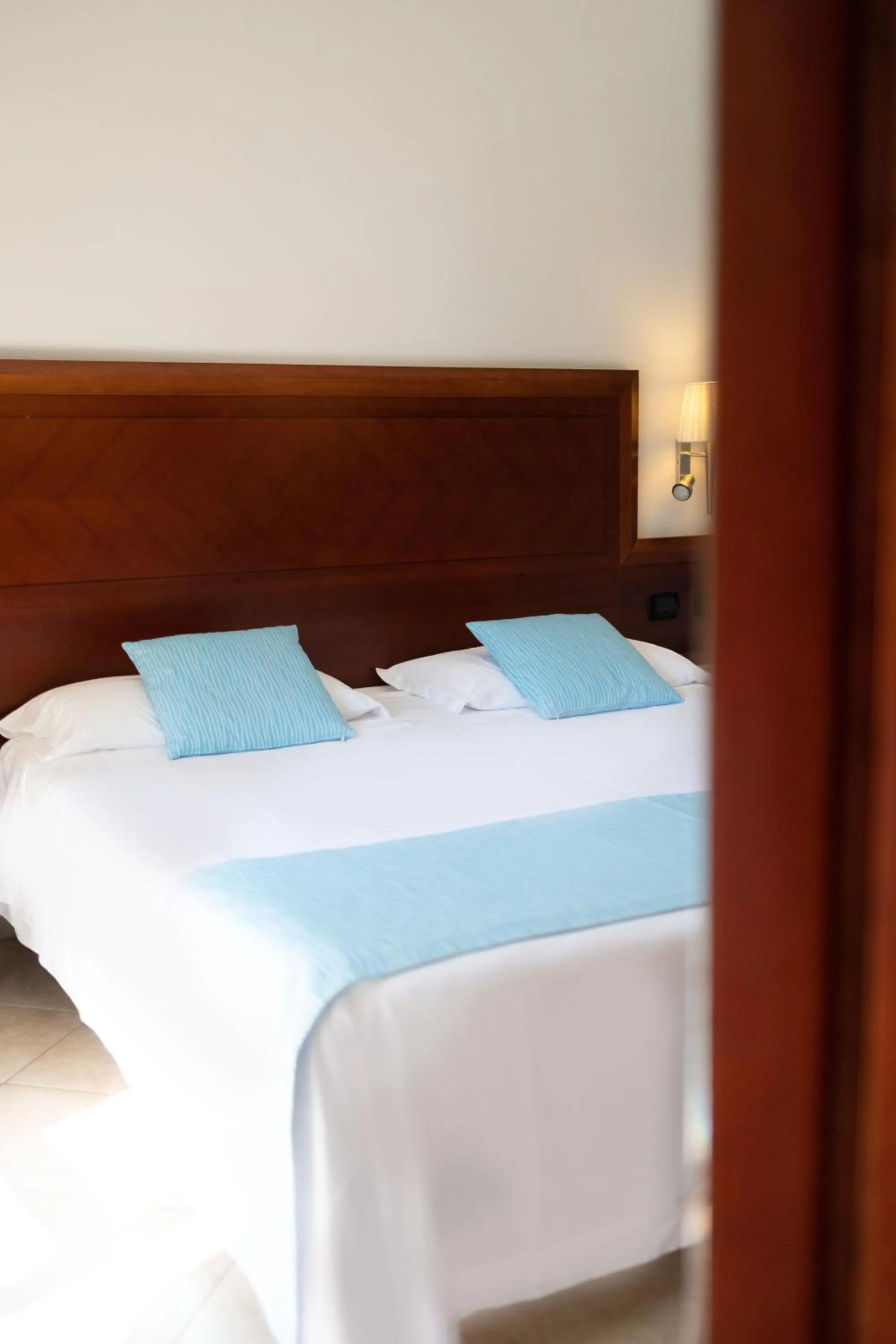 Bed in Hotel Le Palme