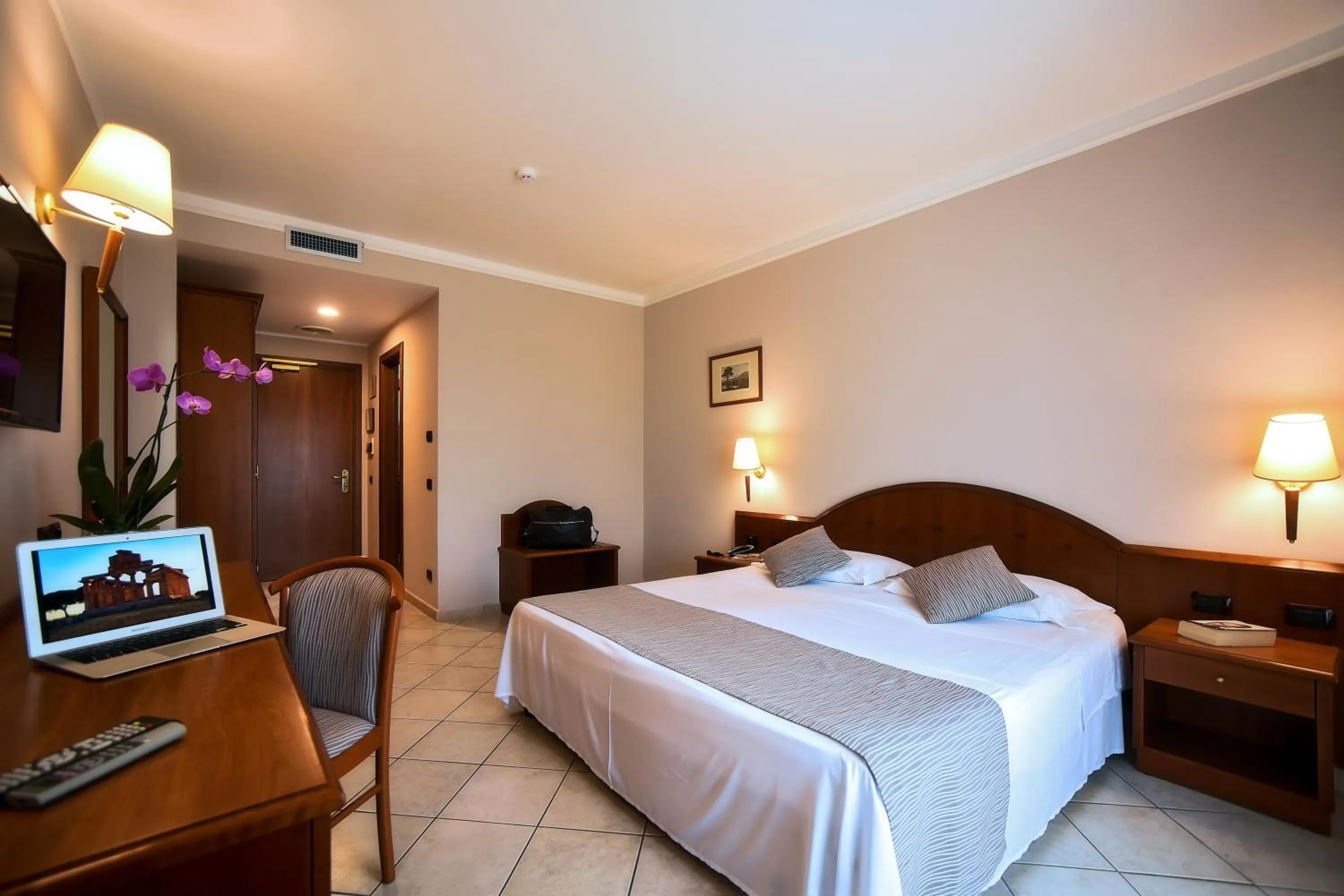 Bed in Hotel Le Palme