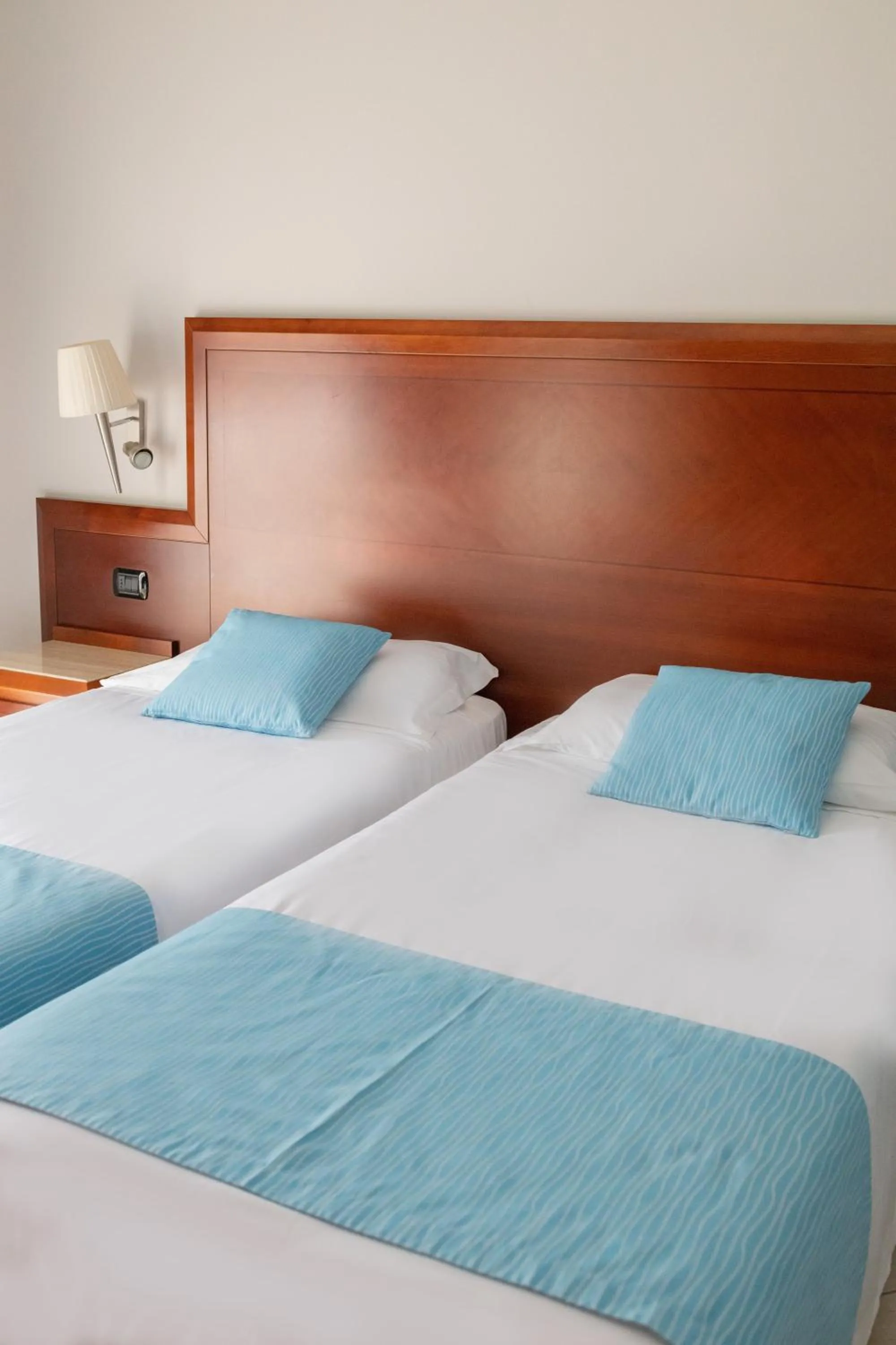 Bed in Hotel Le Palme