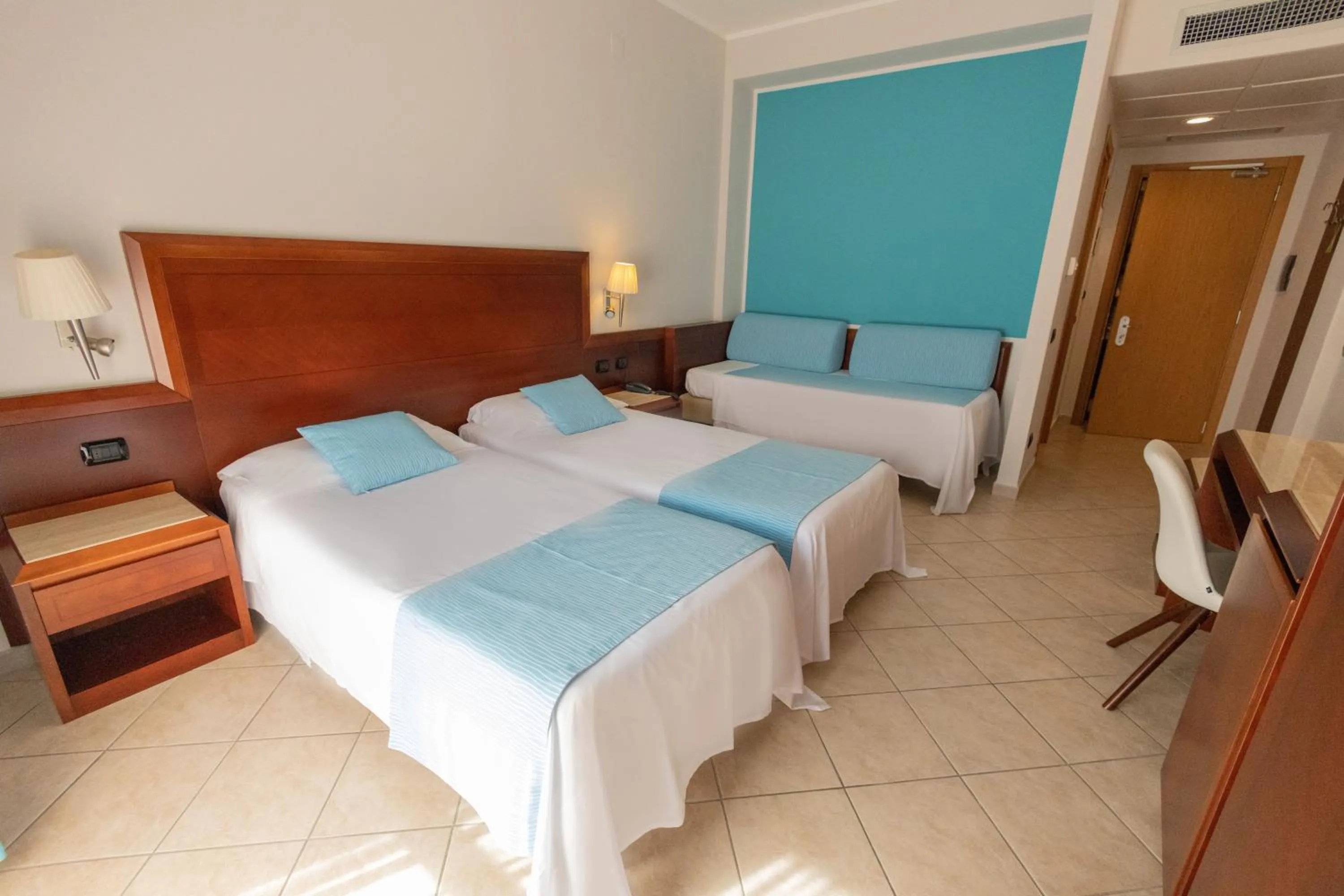 Bed in Hotel Le Palme