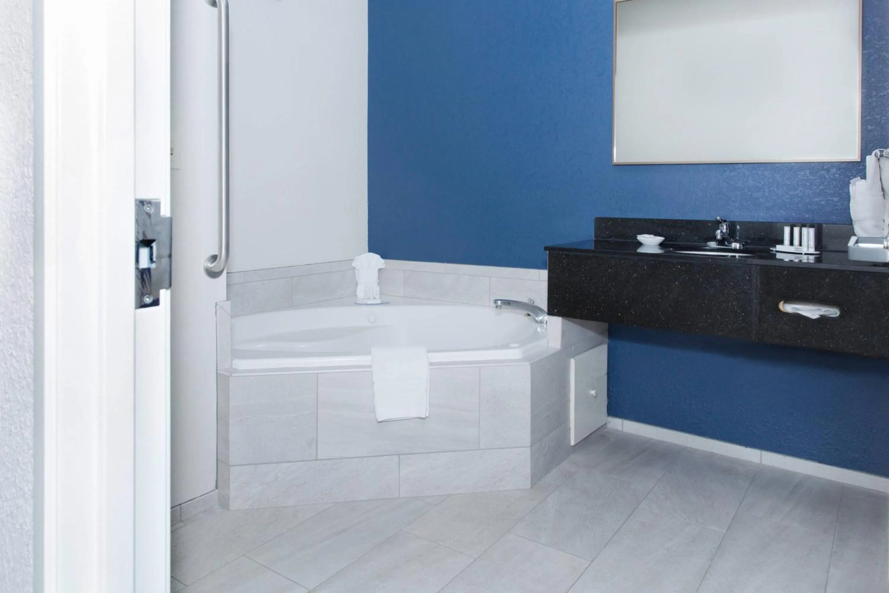 Swimming pool in AmericInn by Wyndham Hays