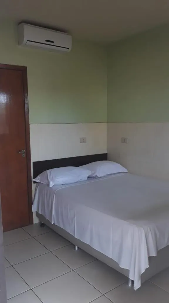 Bed in Hotel Maringa