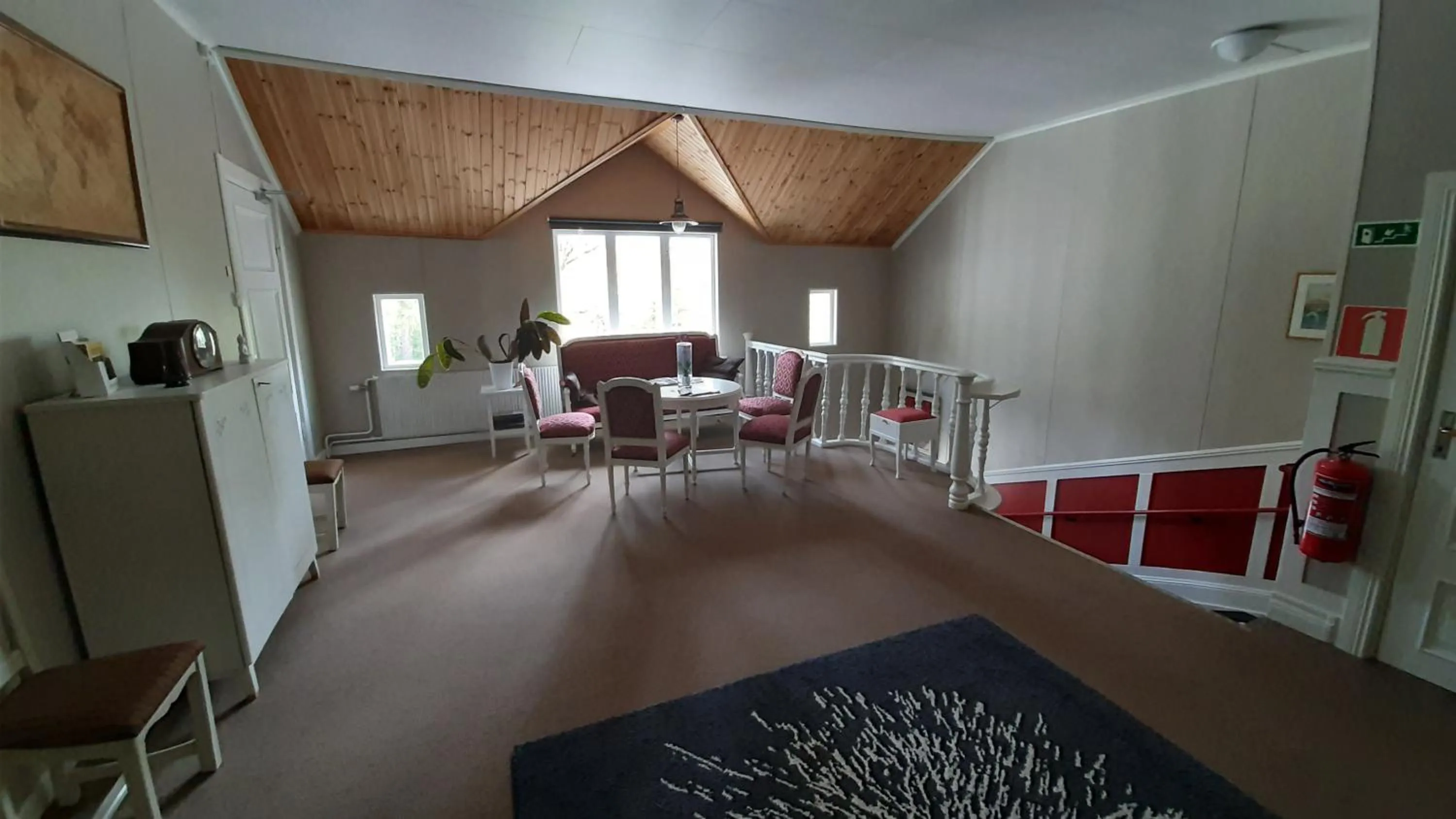 Communal lounge/ TV room in Geijersholms Herrgård