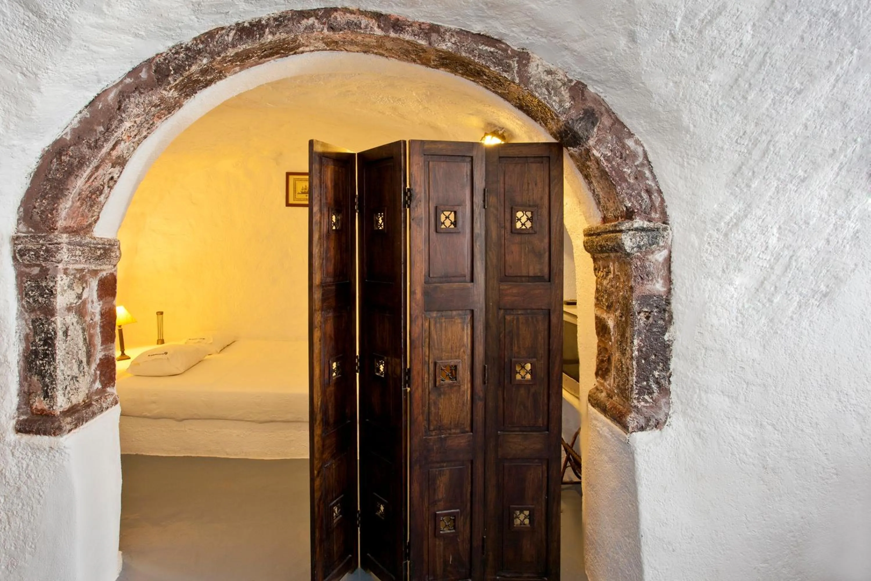 Bed in Alexander's Suites