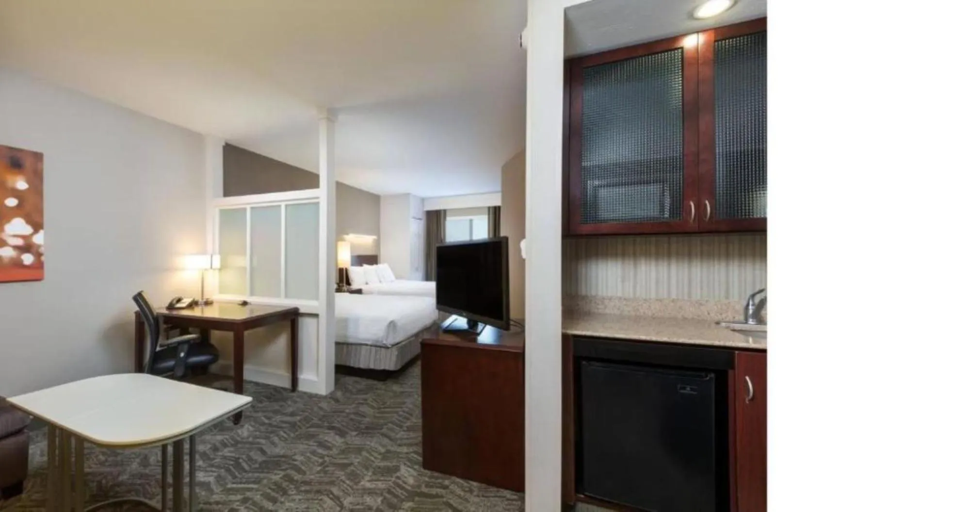 Living room, Bed in SpringHill Suites Indianapolis Fishers