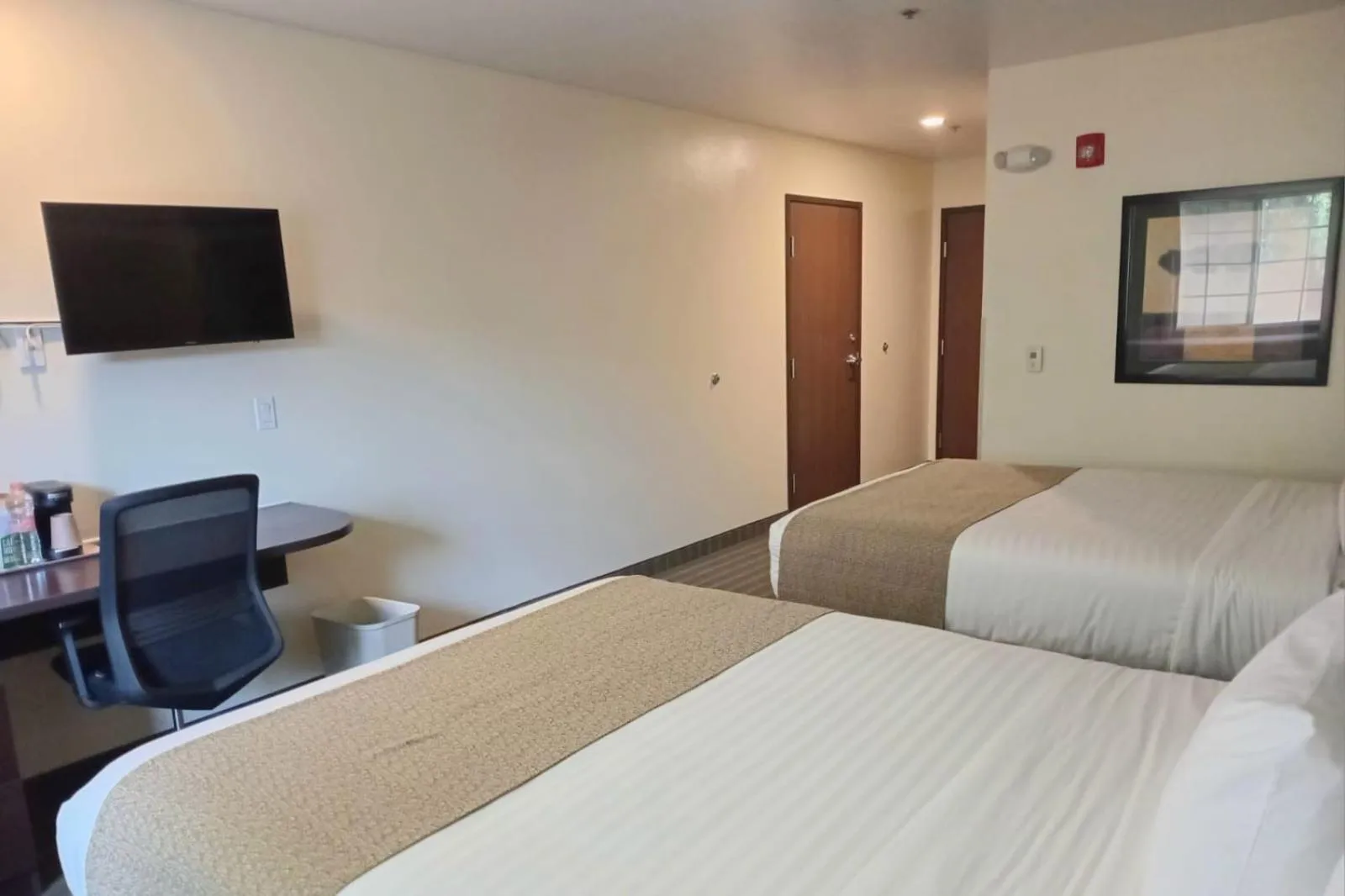 Bed in Microtel Inn and Suites by Wyndham Toluca