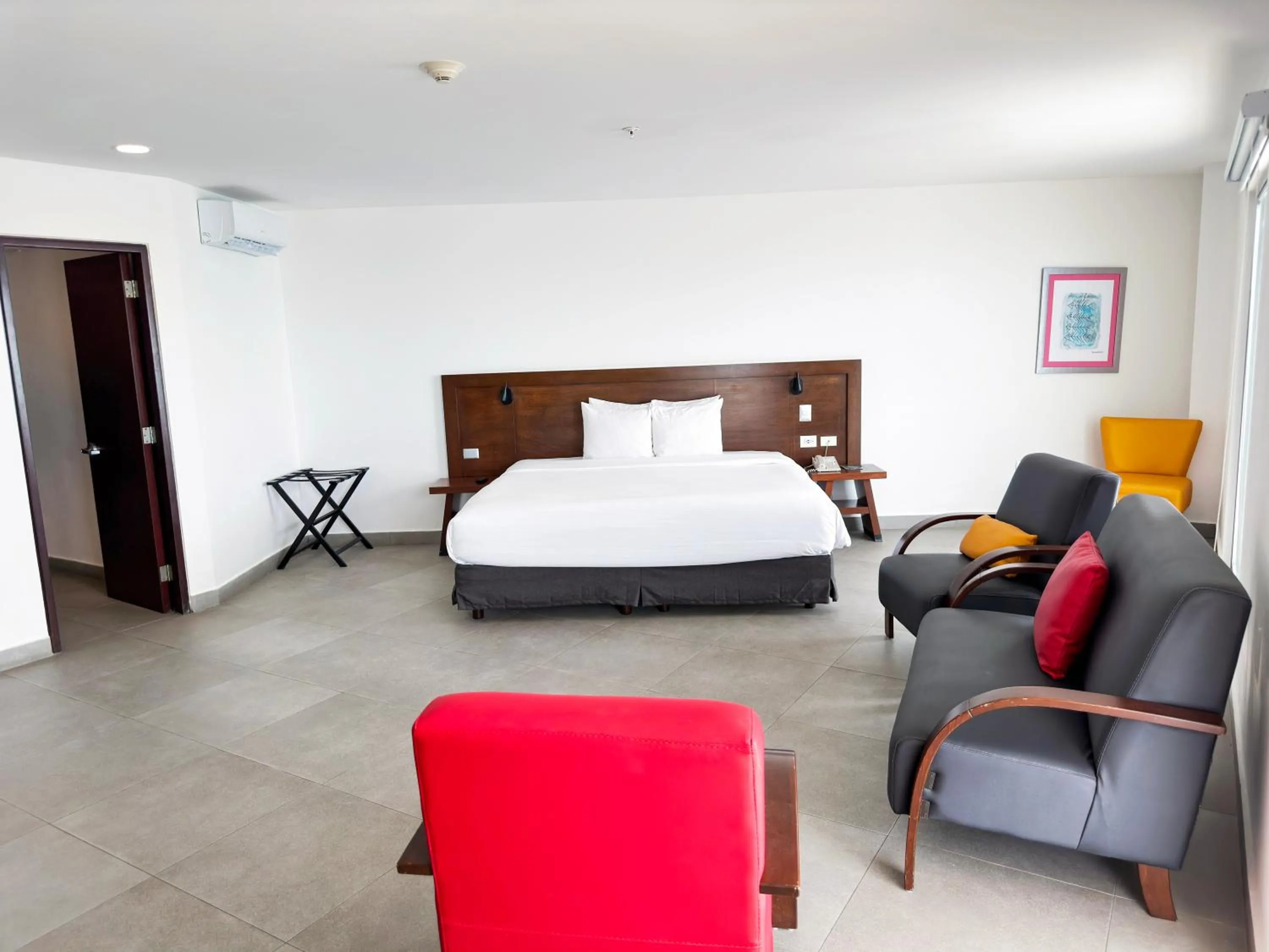 Seating area, Bed in Park Inn by Radisson Mazatlan