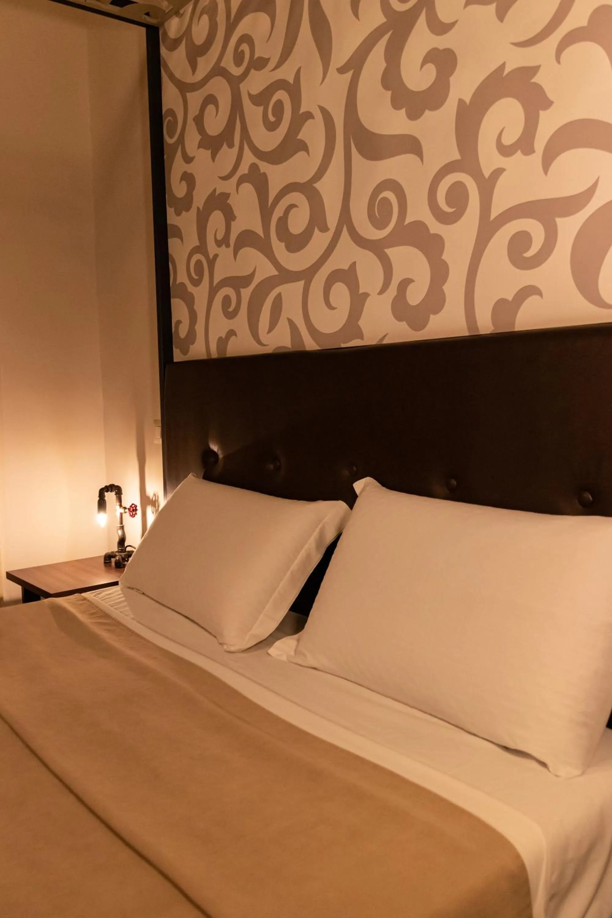 Bed in Duomo Luxury Suites