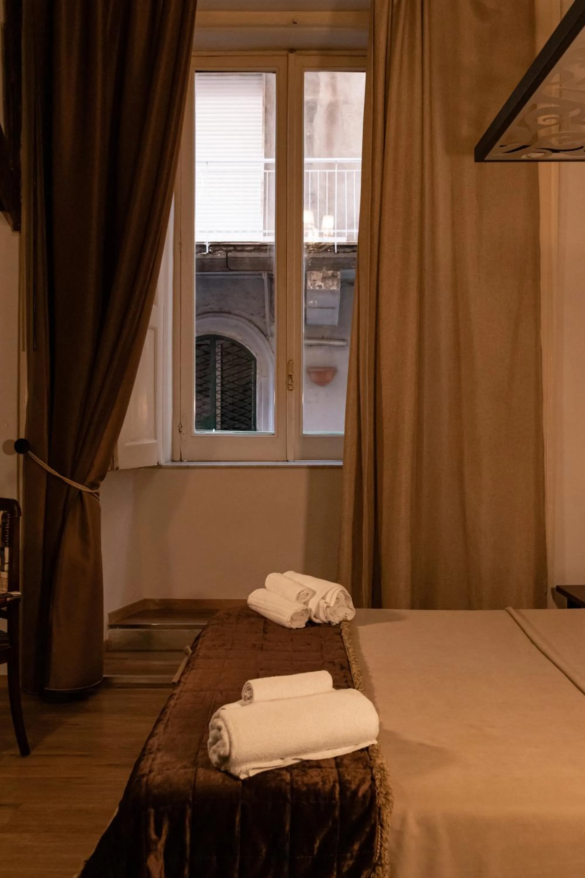 Bed in Duomo Luxury Suites