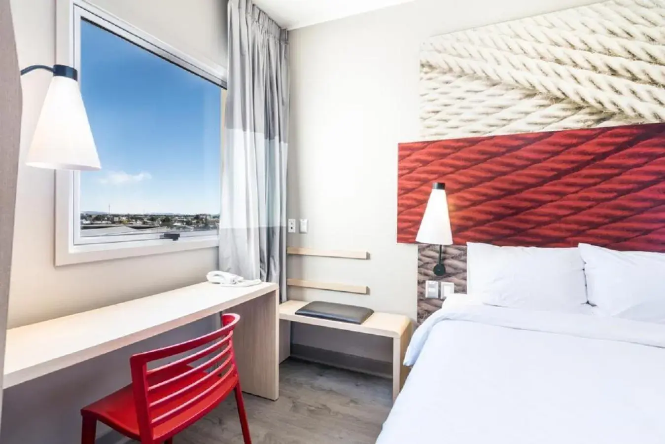 Photo of the whole room, Bed in ibis Iquique Photo of the whole room, Bed in ibis Iquique