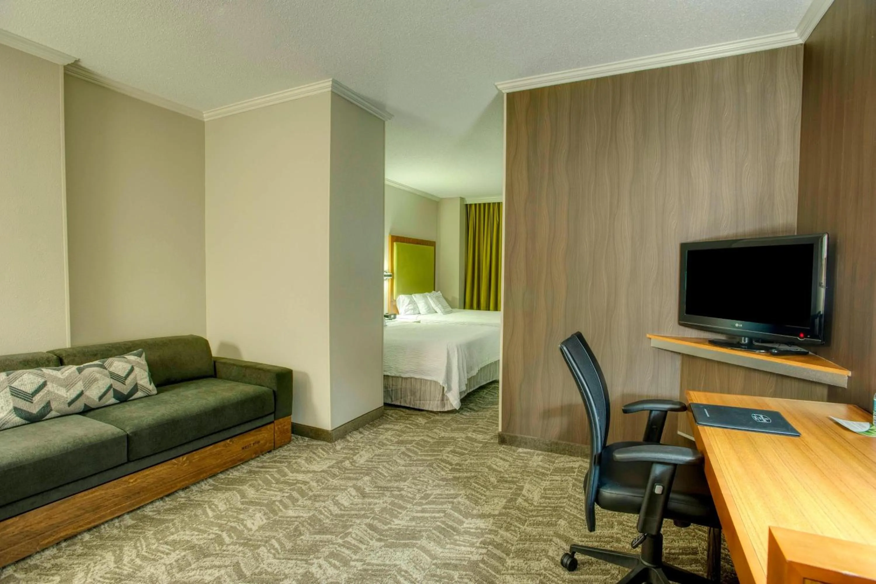 Living room, Bed in SpringHill Suites by Marriott Lawrence Downtown